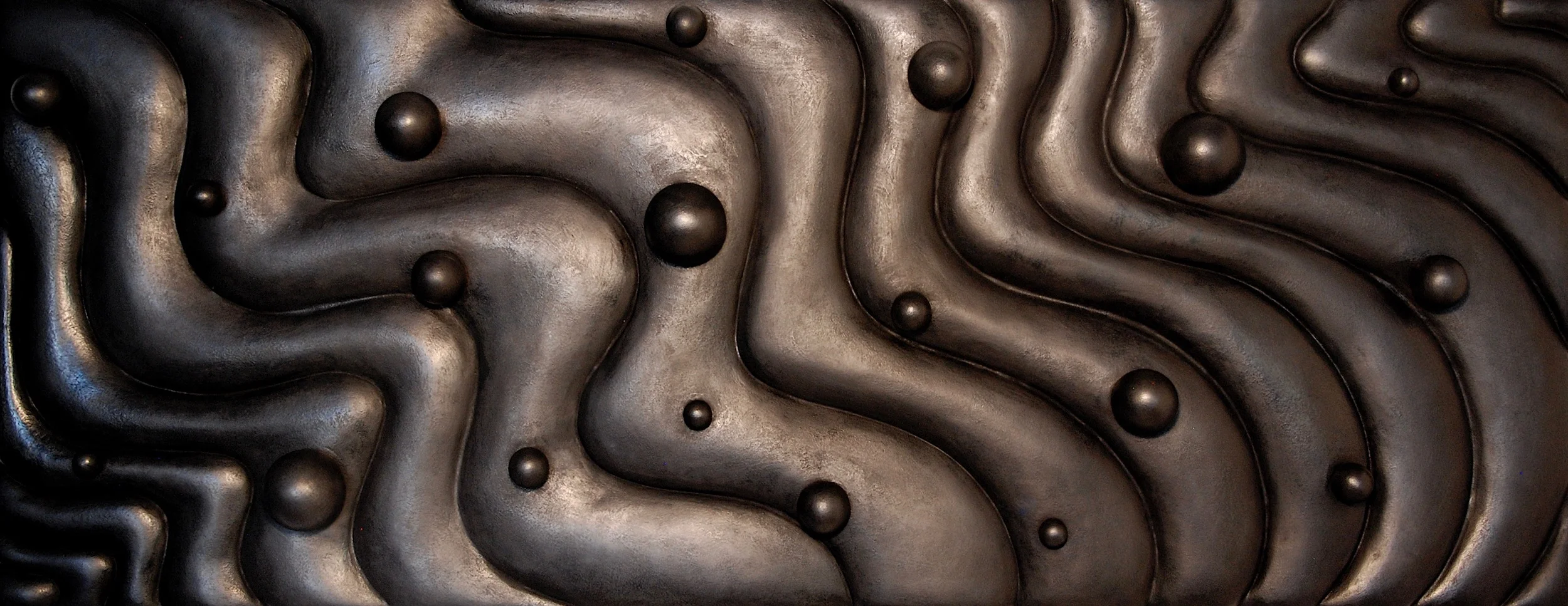 Thomas Coffin - Particles in Wave Field (graphite), 23"h x 59"w x 4"d, mixed media sculptural wall relief