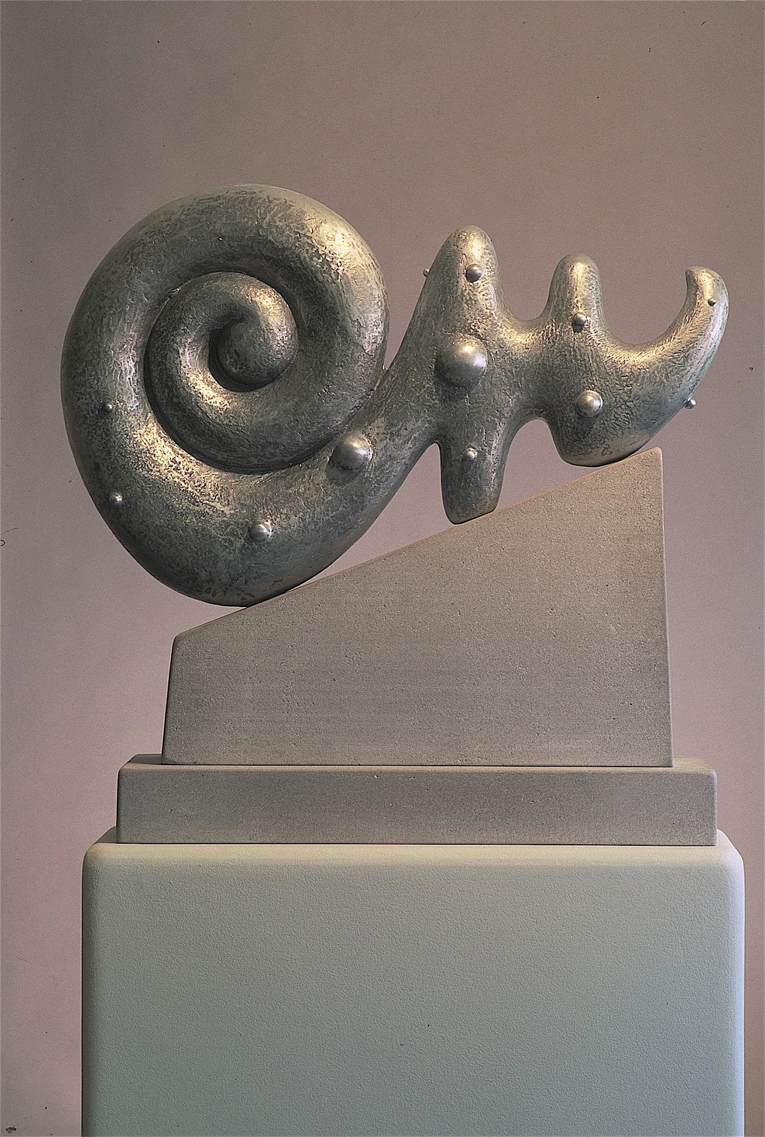 Thomas Coffin - Idol Series, 30"h x 32"w x 6"d, cast aluminum, limestone