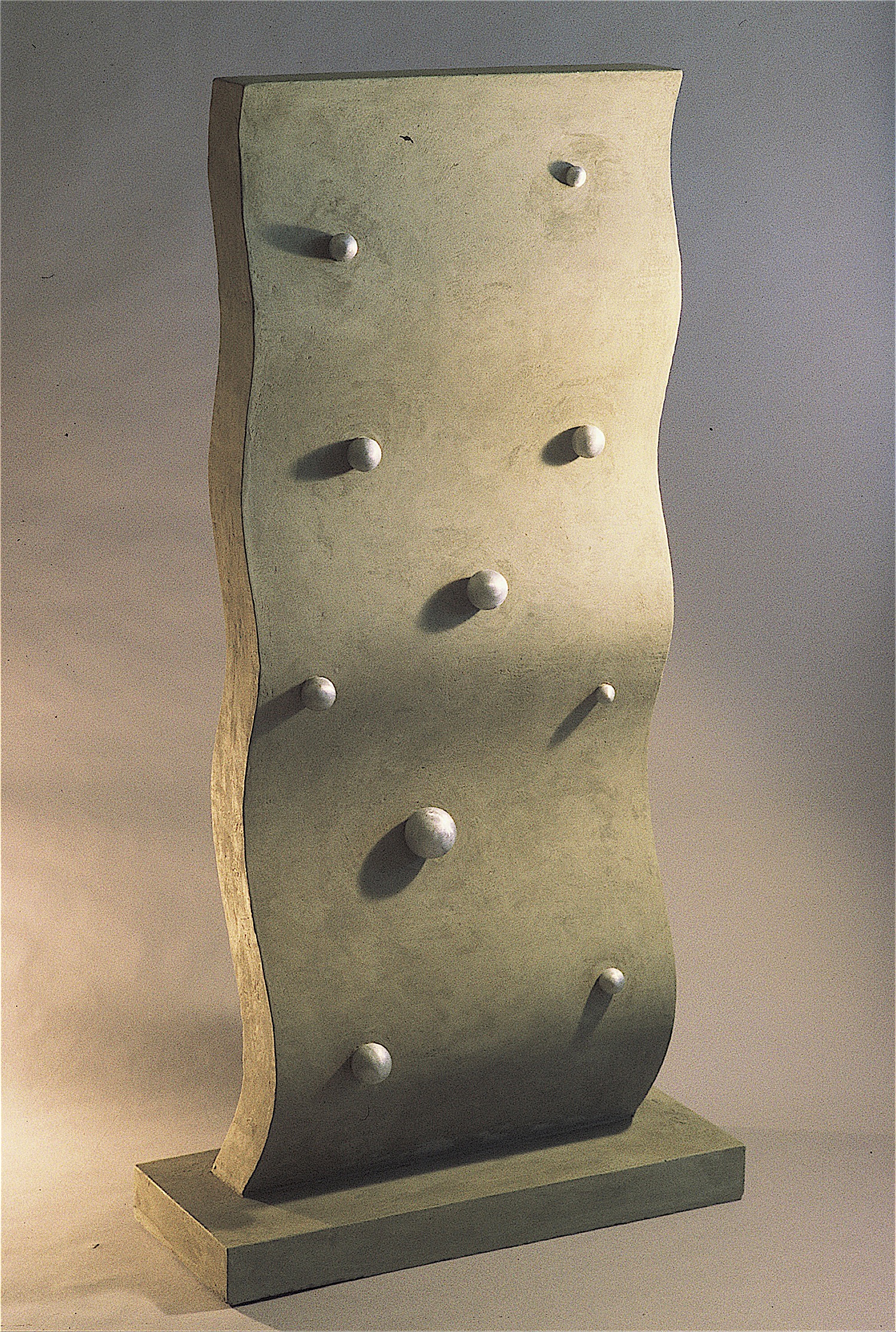 Thomas Coffin - Wave with Particles, 48"h x 24"w x 8"d,  cast concrete, cast aluminum balls