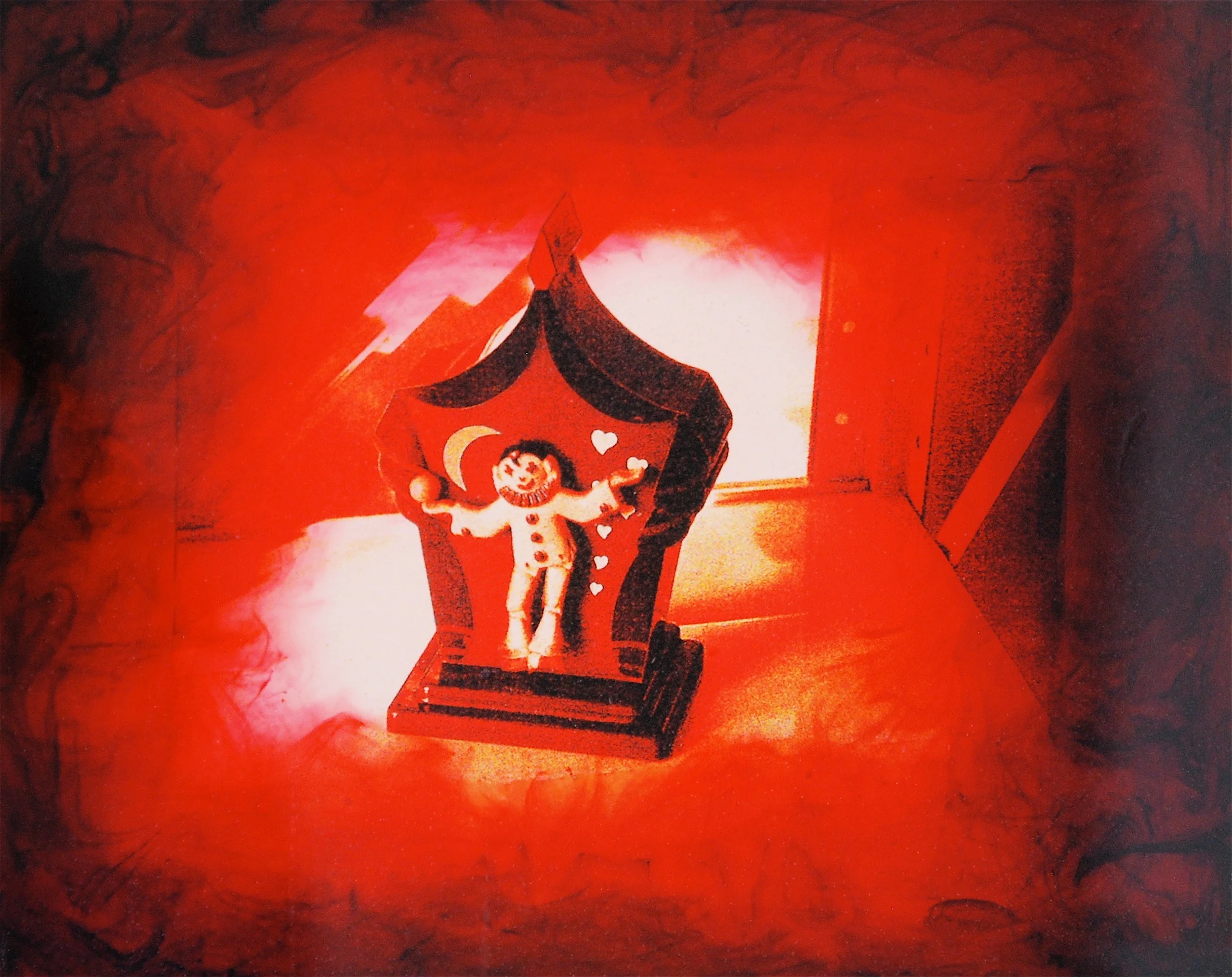 Julia King - Red Clown (detail), 10"h x 11 1/2"w x 1 3/4"d, photography based 3-d mixed media, resin, pigment, handmade wood frame