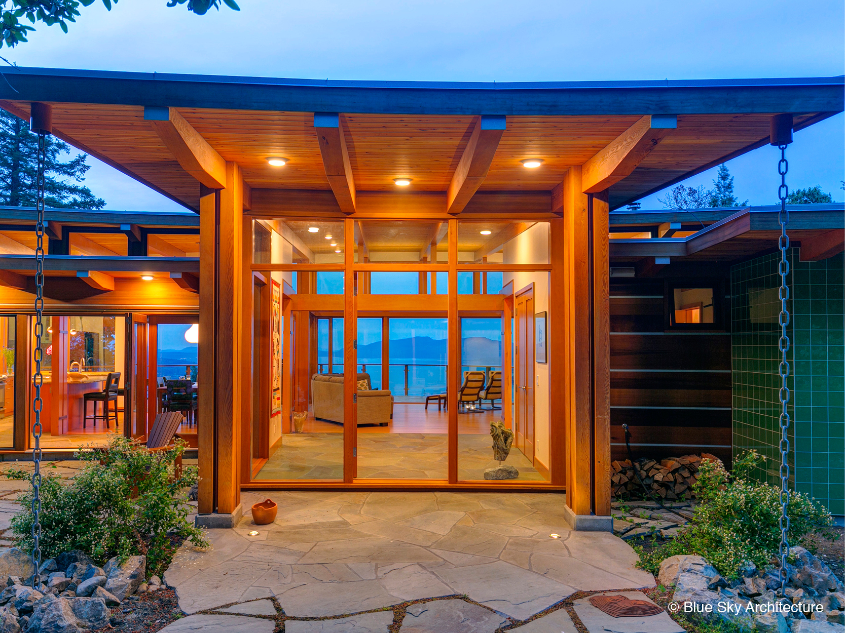 Island residential architecture with heavy timber entryway