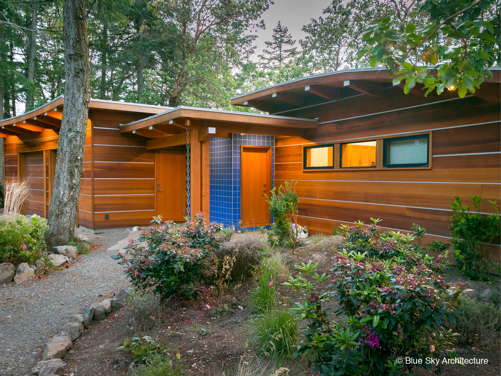 Cedar and tile entryway to West Coast Modern guest house