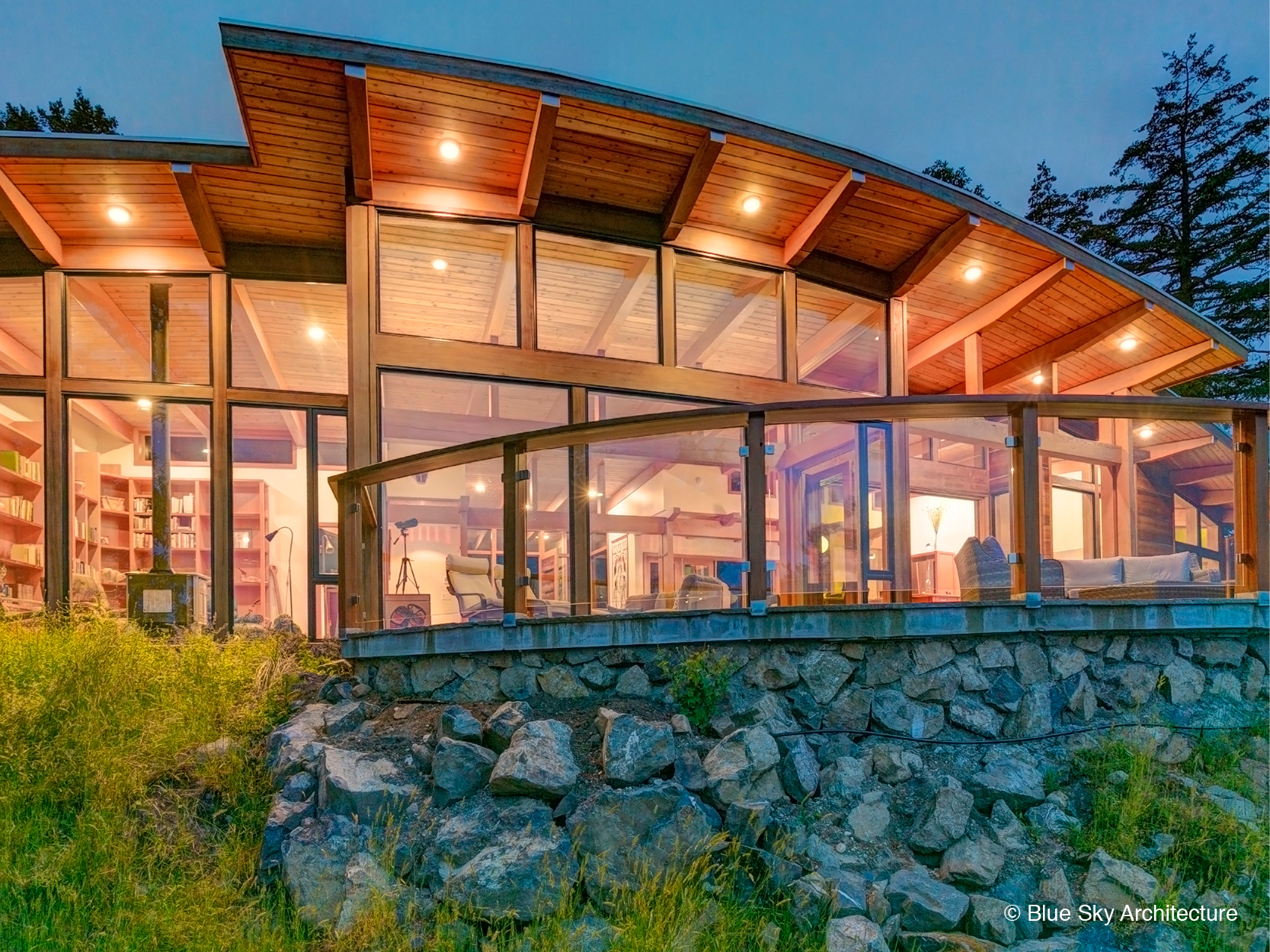 Exterior heavy timber framing on island residential design