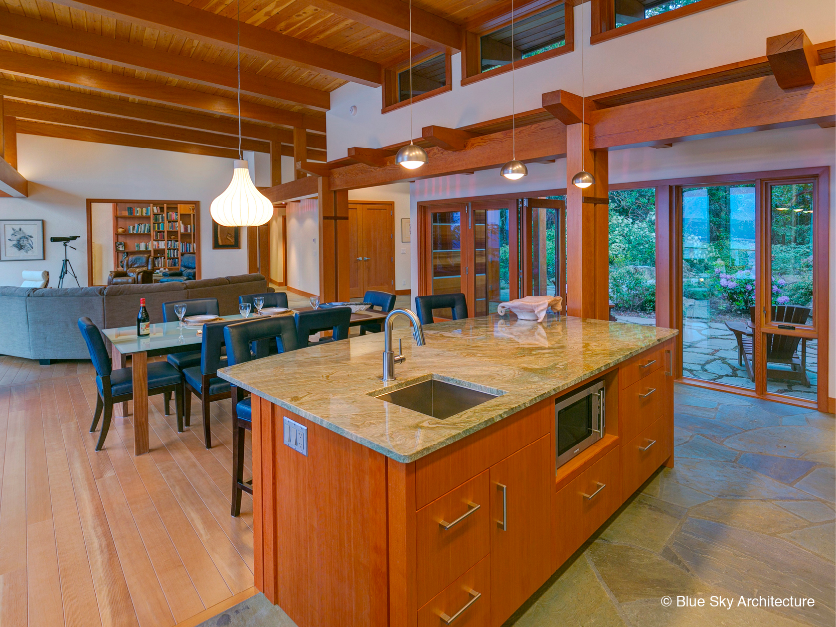 Open concept kitchen with heavy timber and natural lighting