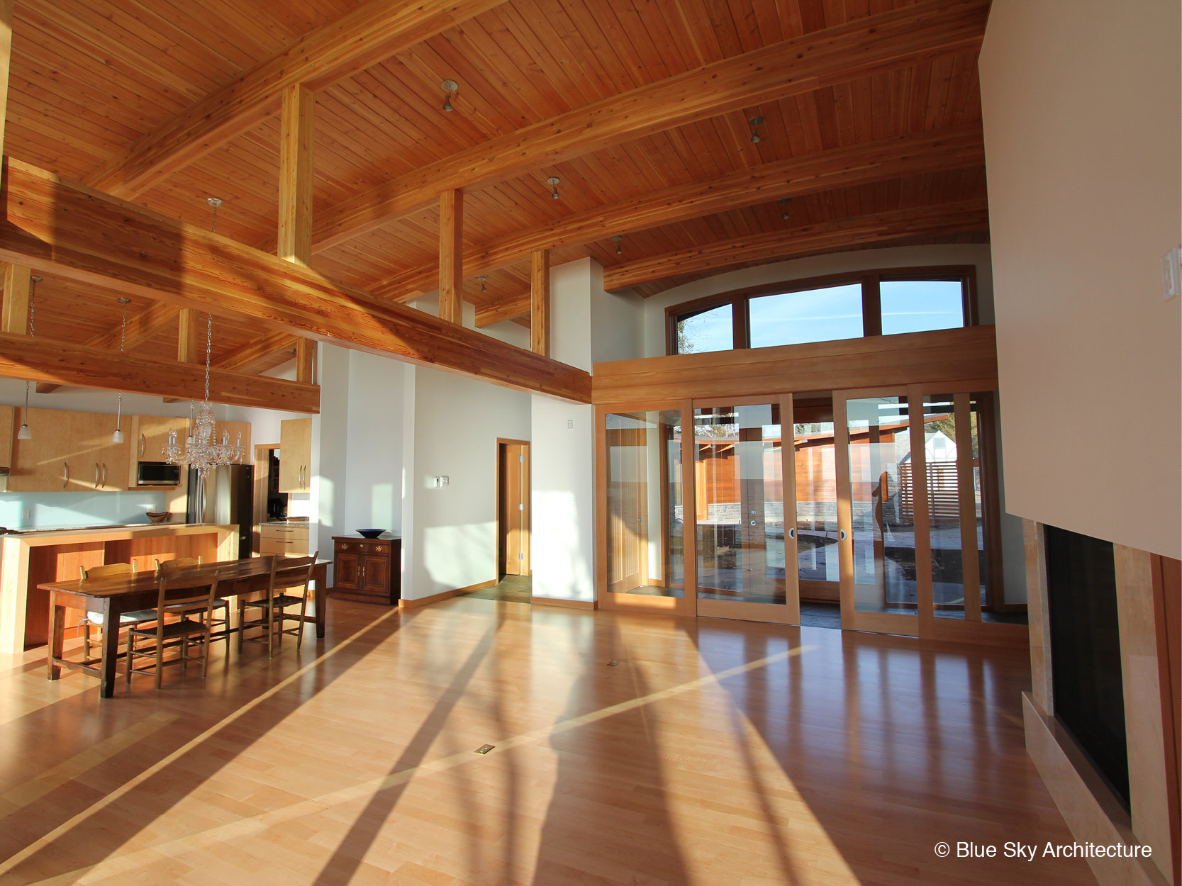 Open-floor-plan wood kitchen in lakefront home