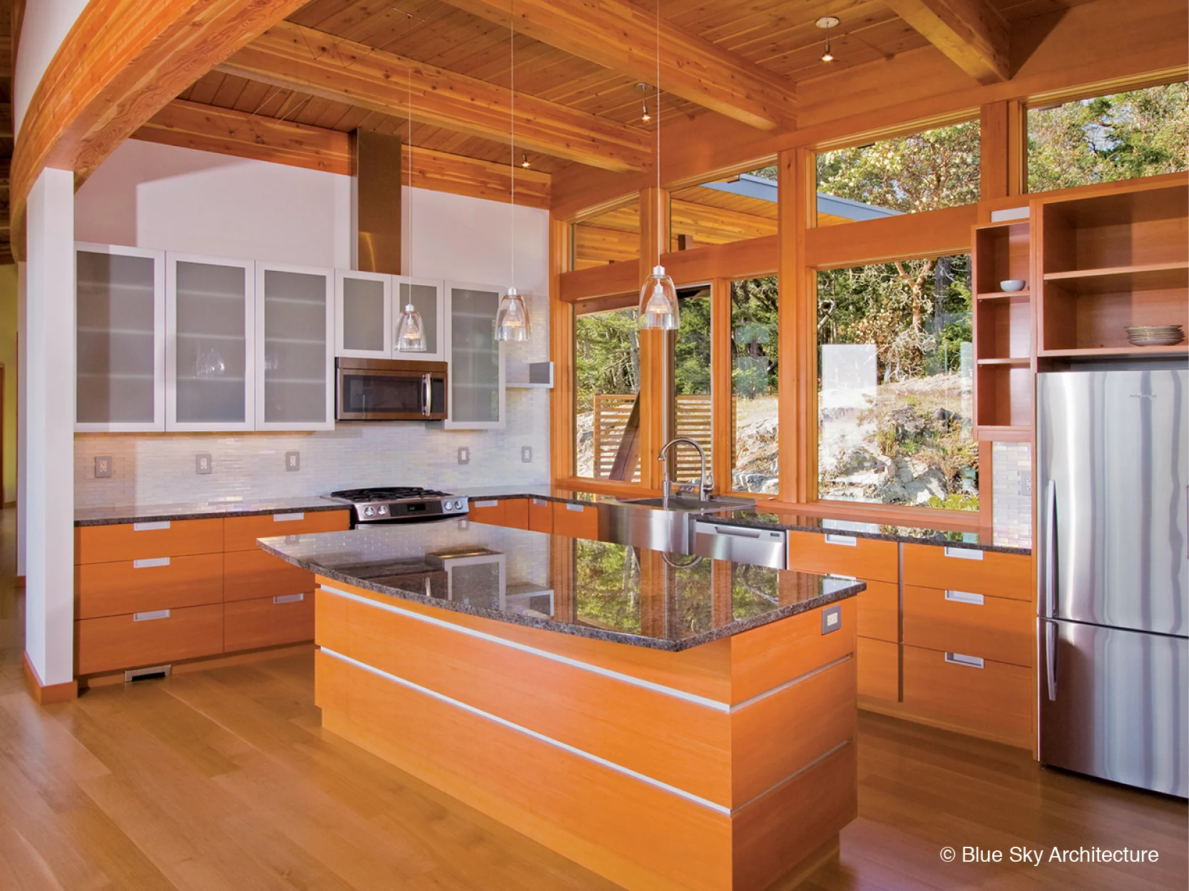 Wood and beam construction kitchen in open concept house
