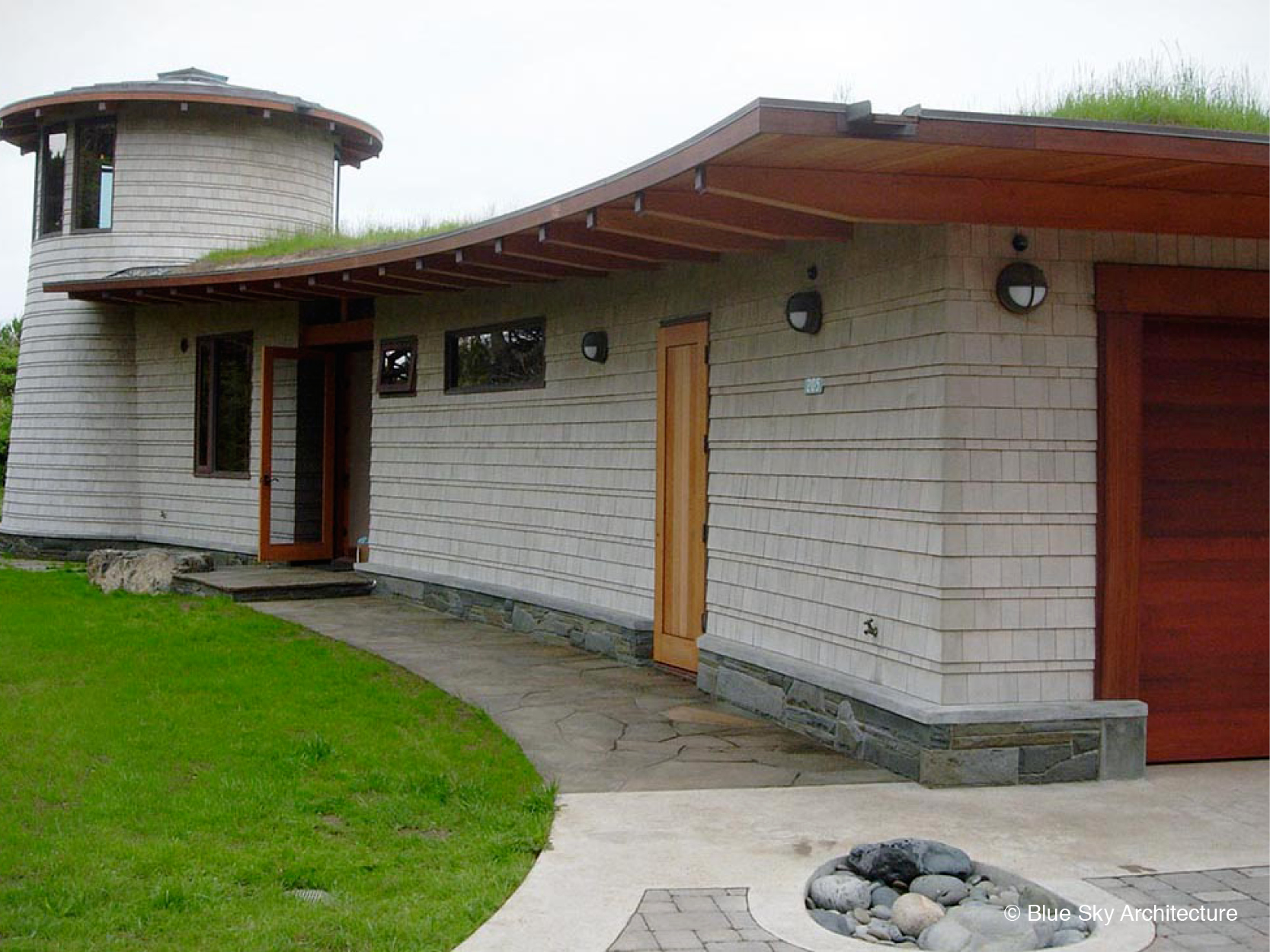 Custom residence with exterior shingle cladding
