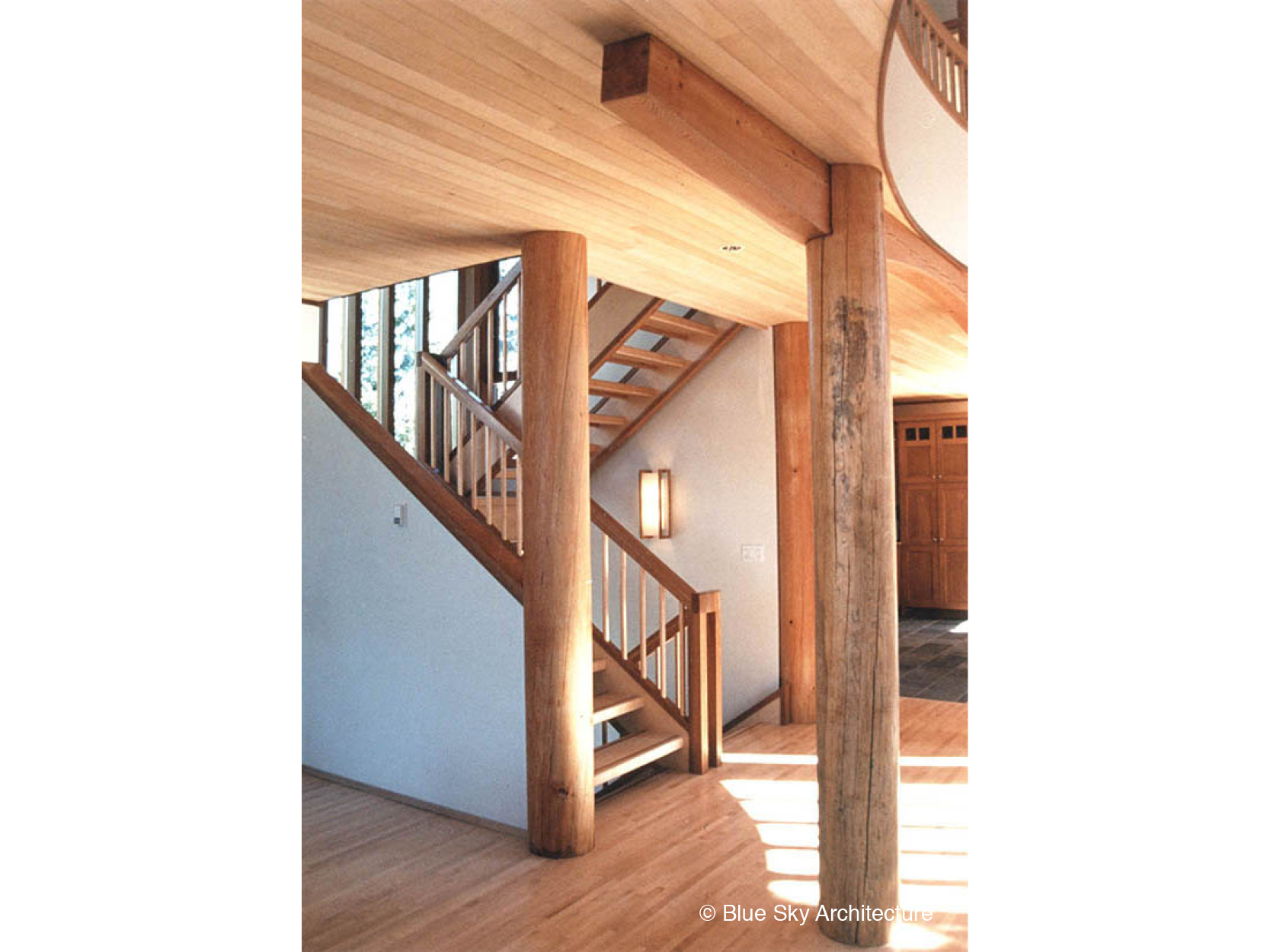 Heavy Timber Construction with Natural Log Columns