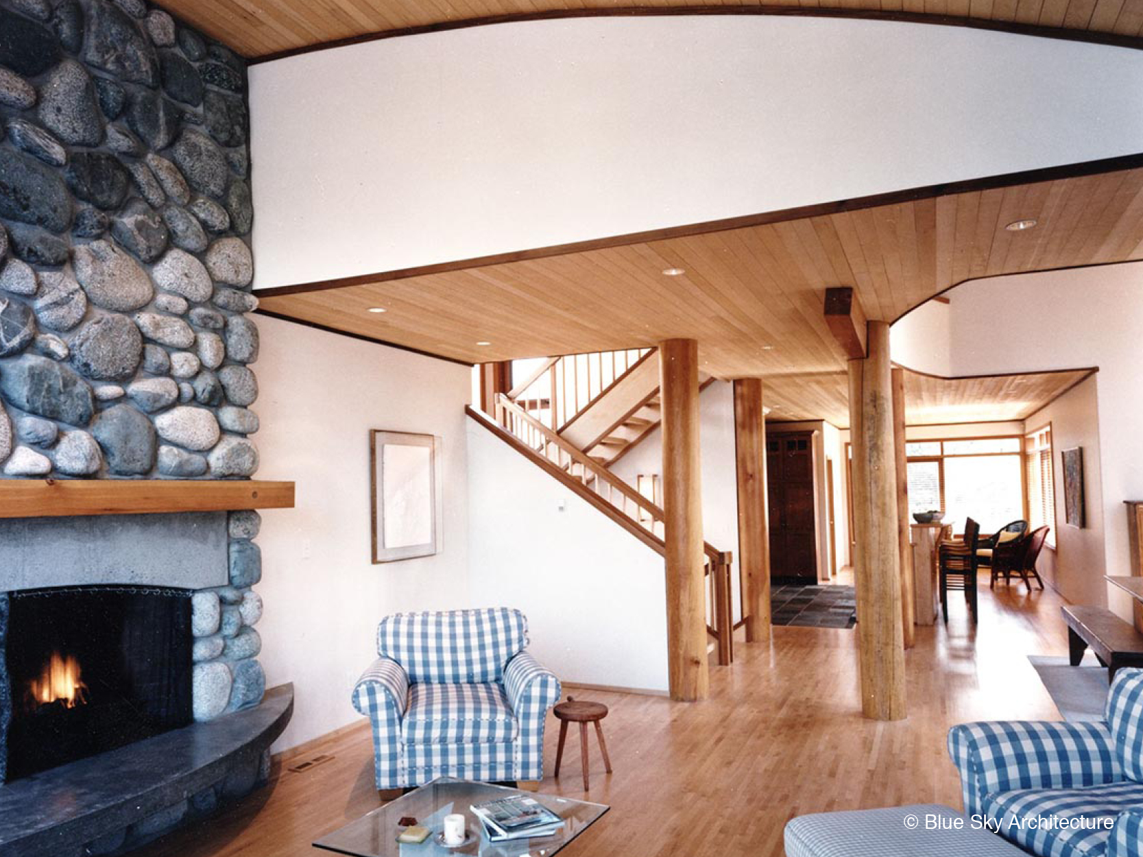 Open Plan Living Room with Stone Fireplace and Natural Materials