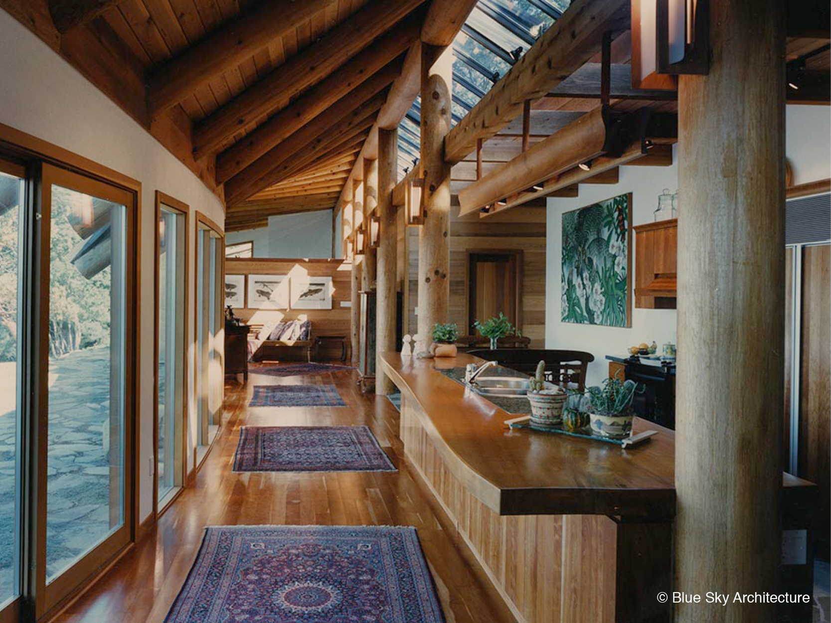 Open Floor Plan Kitchen with Natural Log Rafters