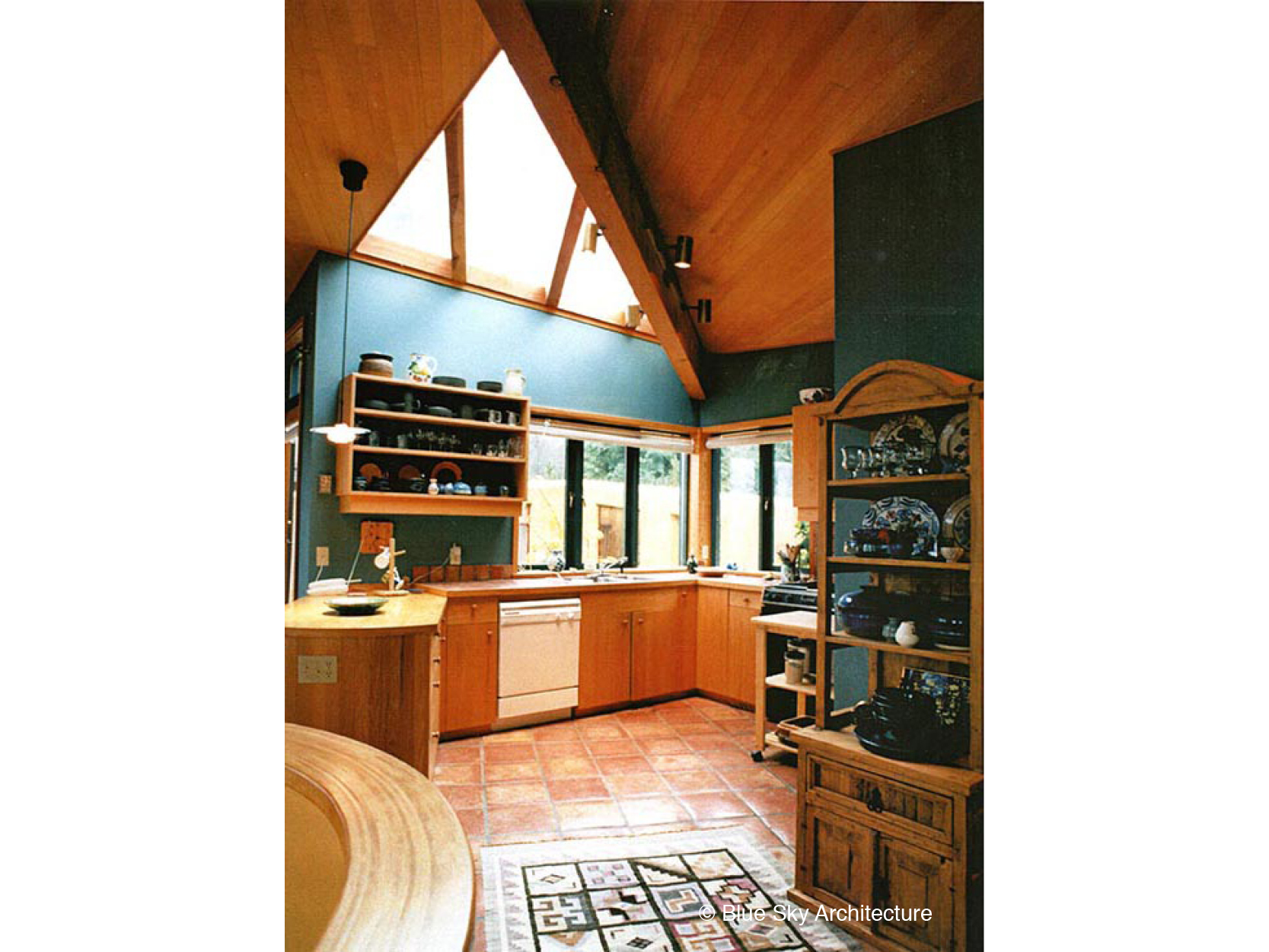 Kitchen with Fir Ceiling and Skylight