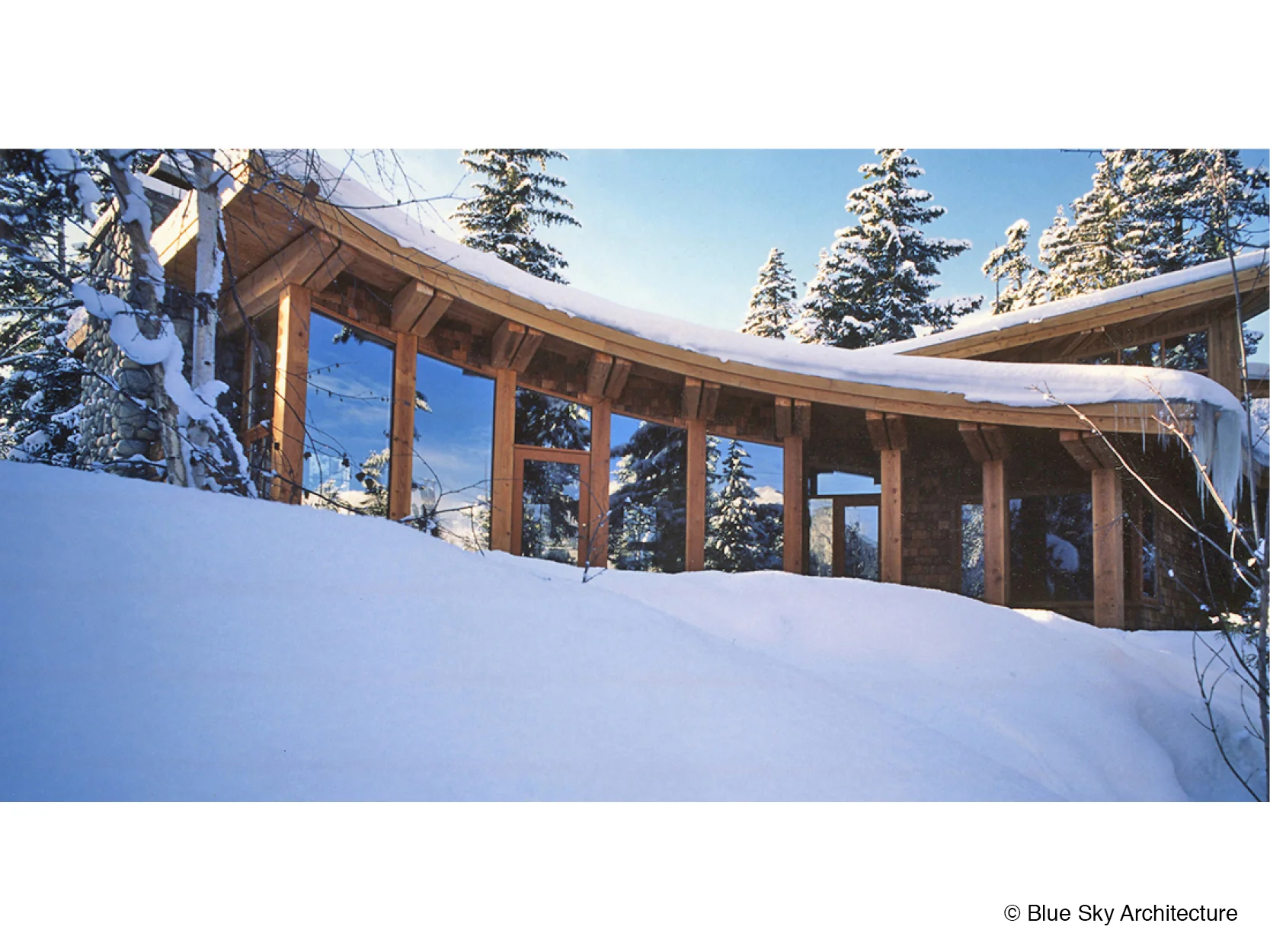Heavy Tiimber Mountain Residence with snow