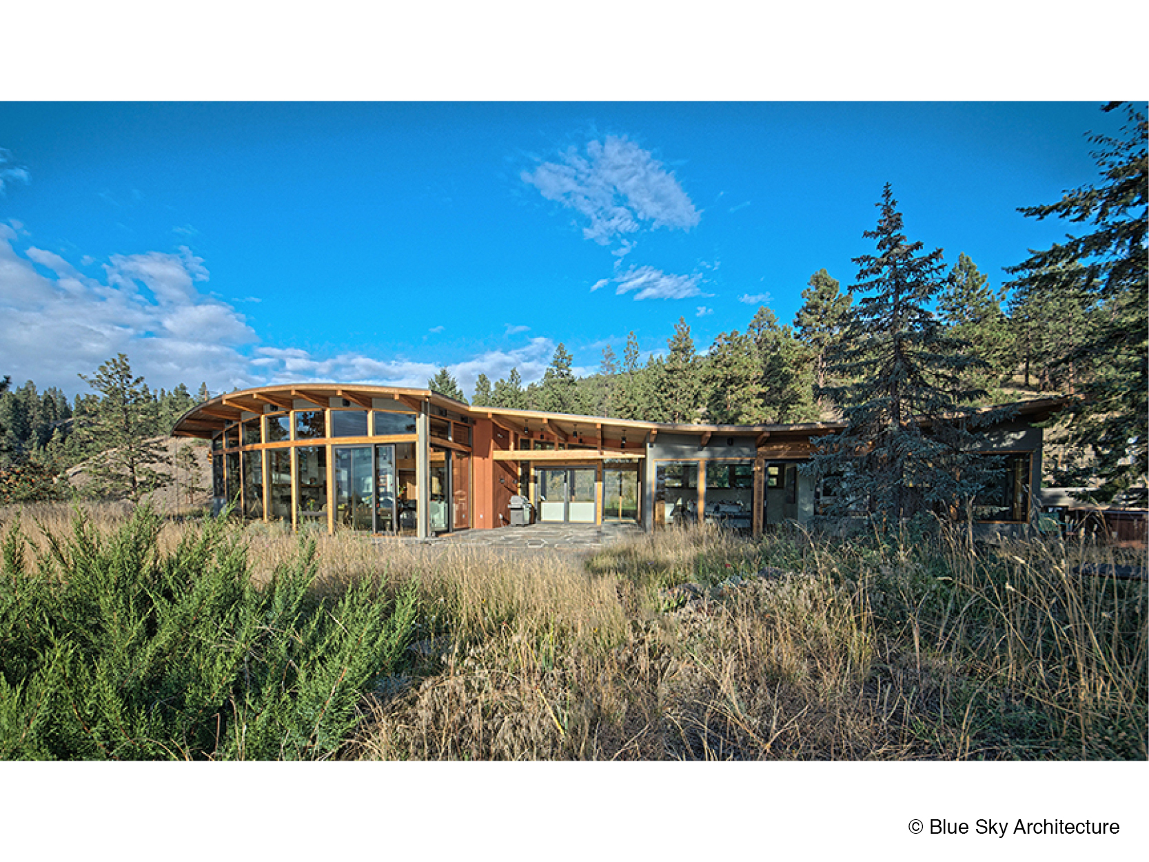 Full exterior view of the lakefront home design for Naramata Bench House