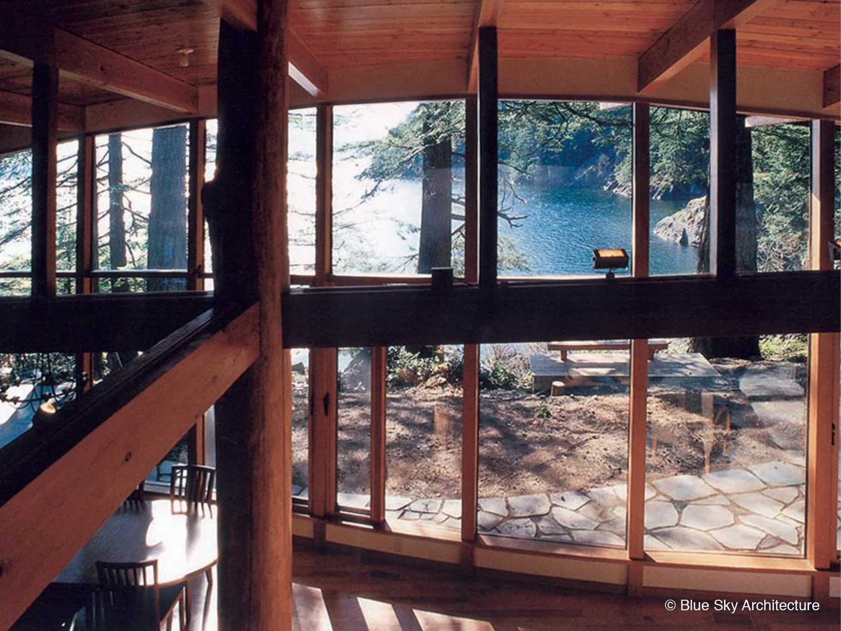 Post and beam framing of the living room in Deer Path House