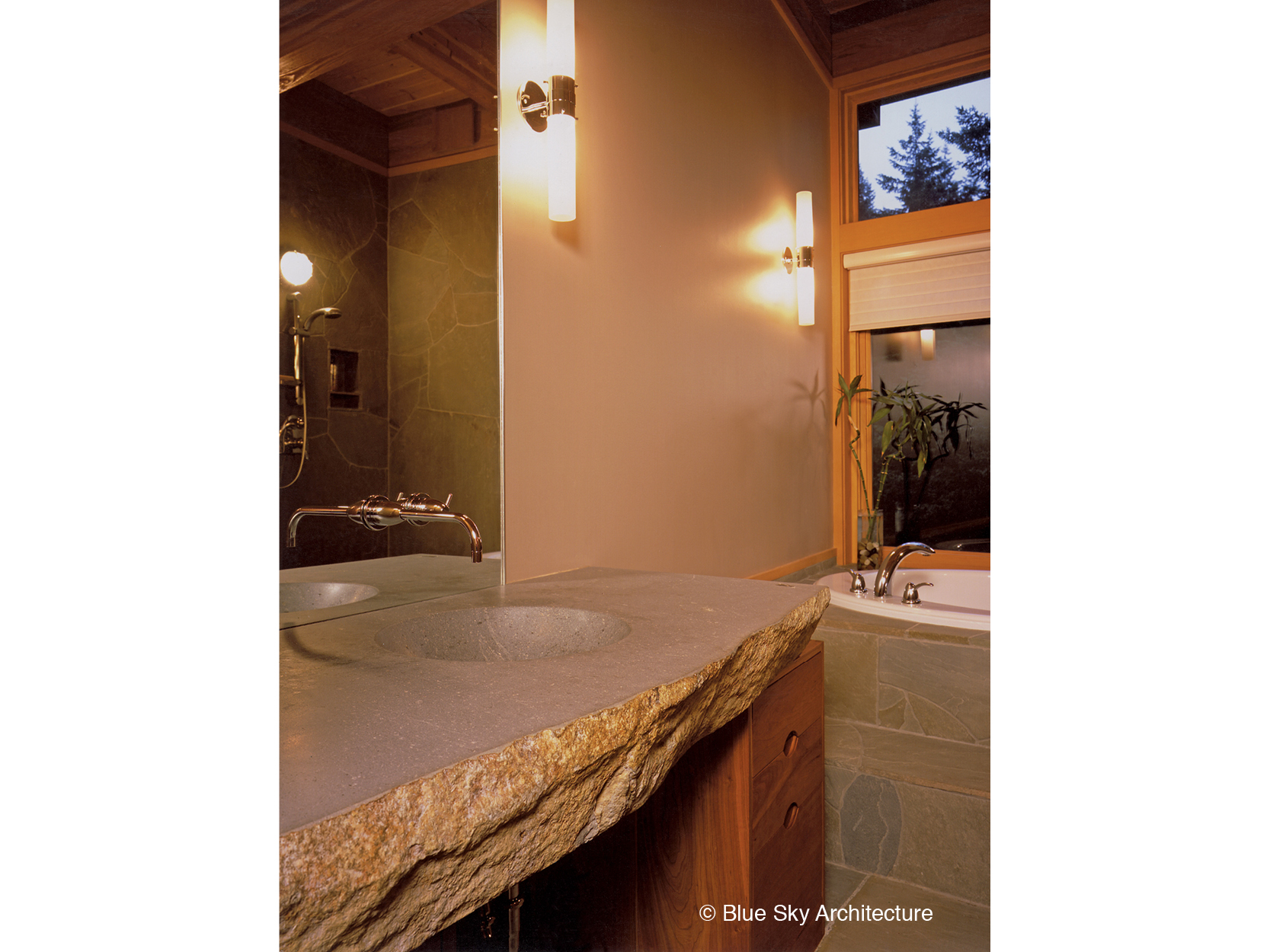 Basalt slab counter top in guest bath