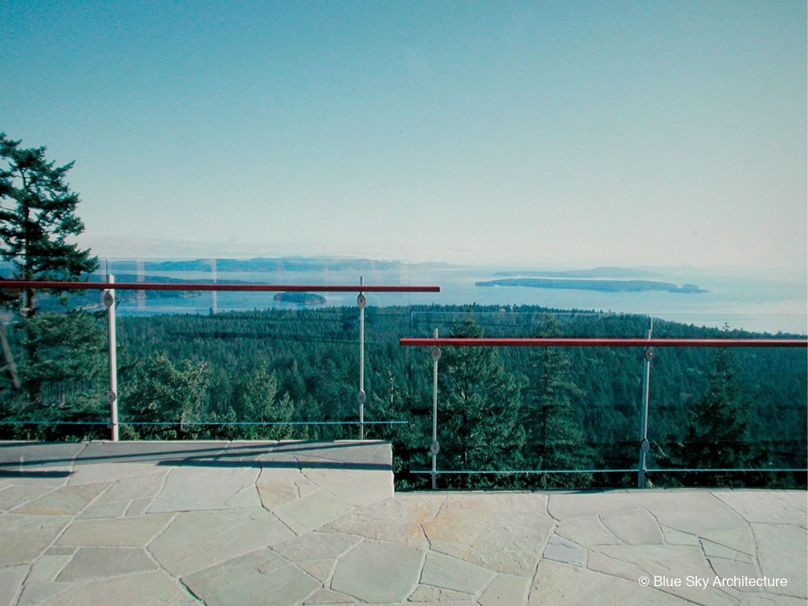 Glass railing and slab terrace of the Hill House