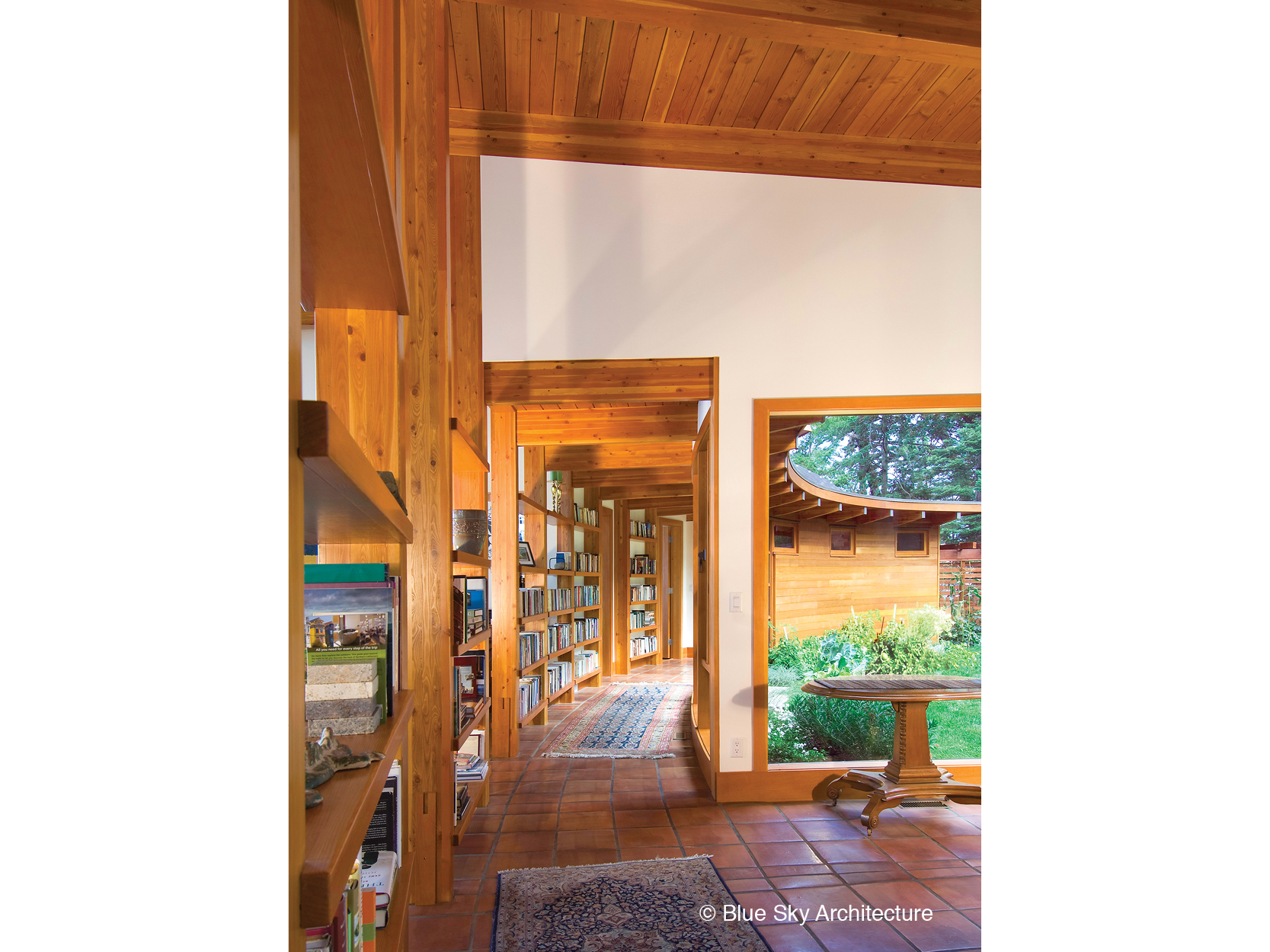 A circular, library hallway in the Booklovers House