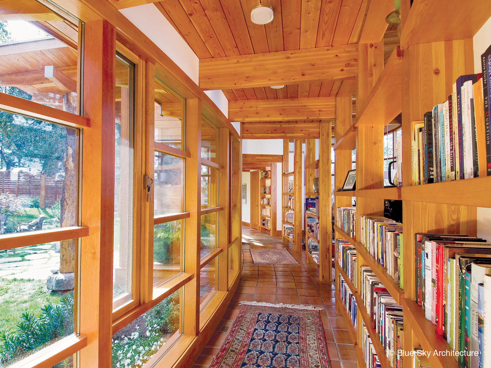 Built-in hallway library in Booklovers House