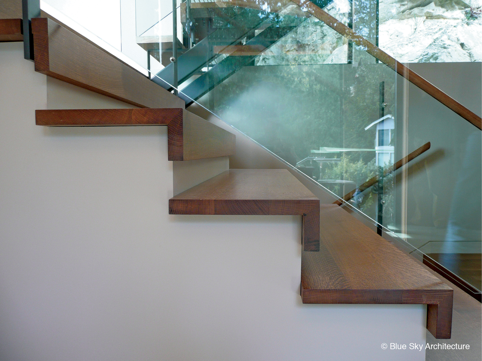 Glass and wood stair detail in Harbour House