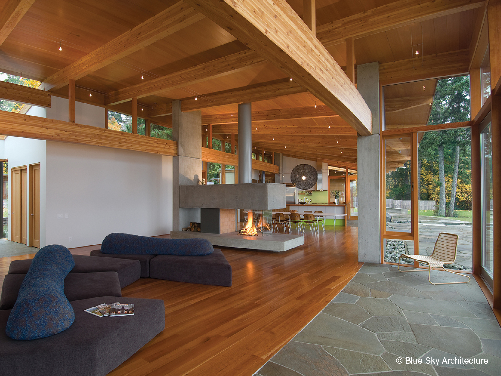 Wood rafter ceilings and open floor plan of Miracle Beach House