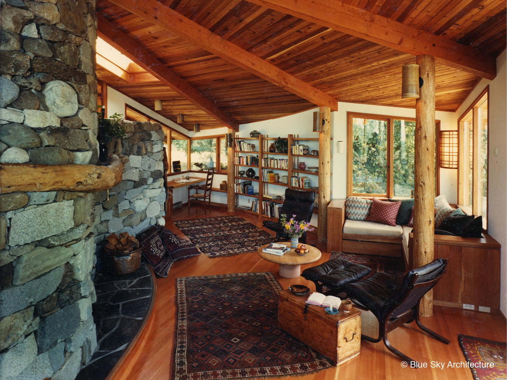 Heavy Timber Ceiling with Natural Log Columns and Radial Rafters