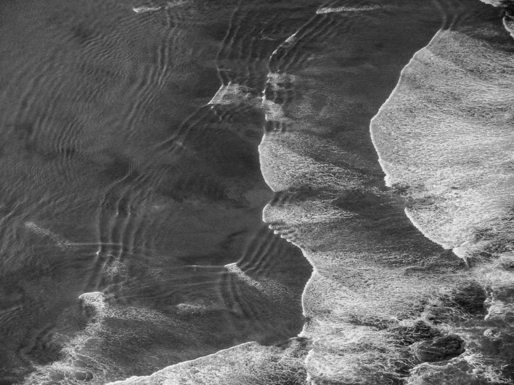  Waves on the shore of a beach. 