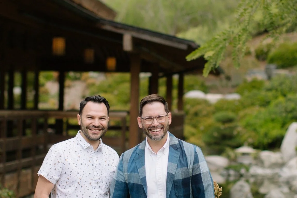 Dr Greg Koch and husband, Jose, smile while in the Japanese Friendship Garden