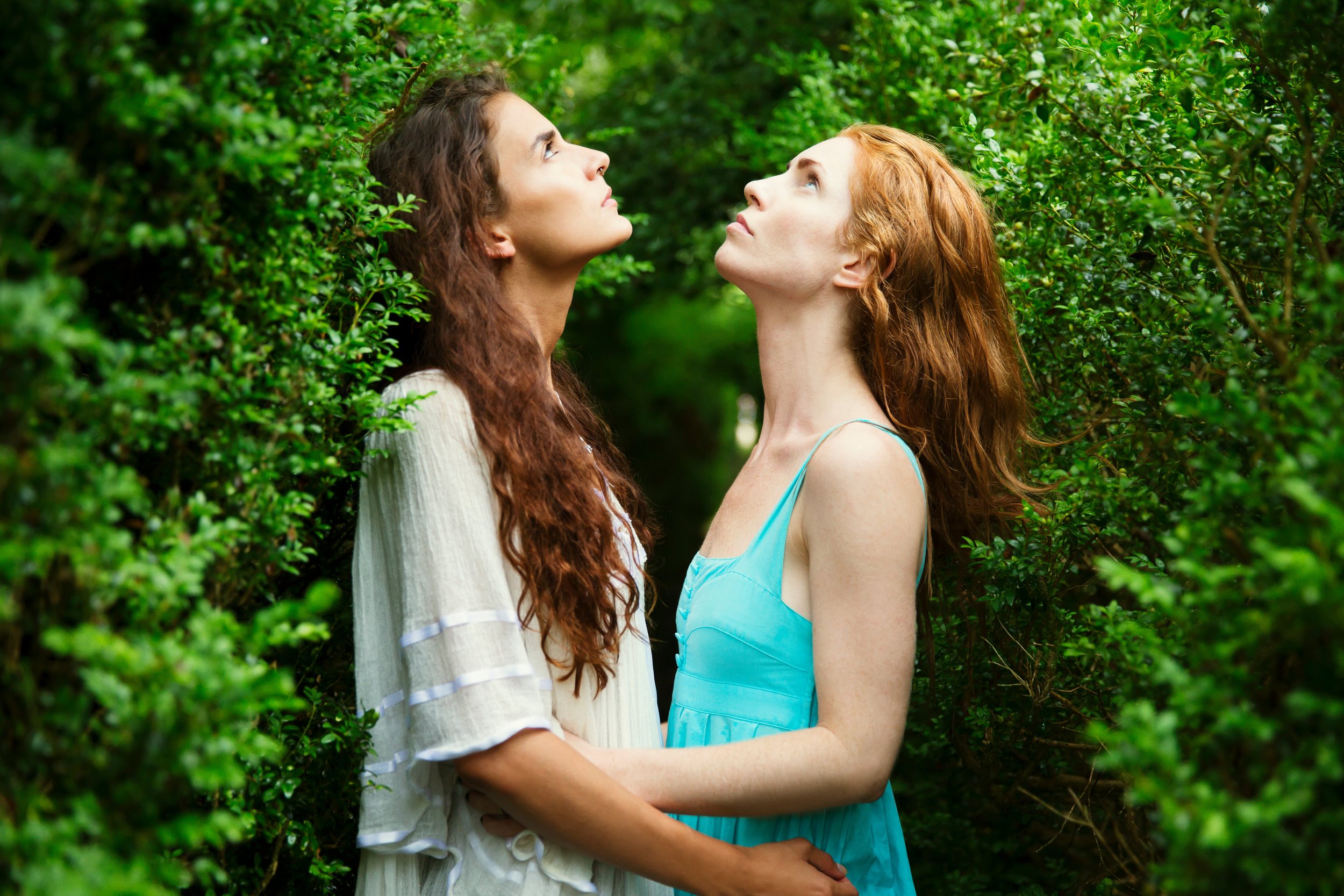 Two women look up at the sky