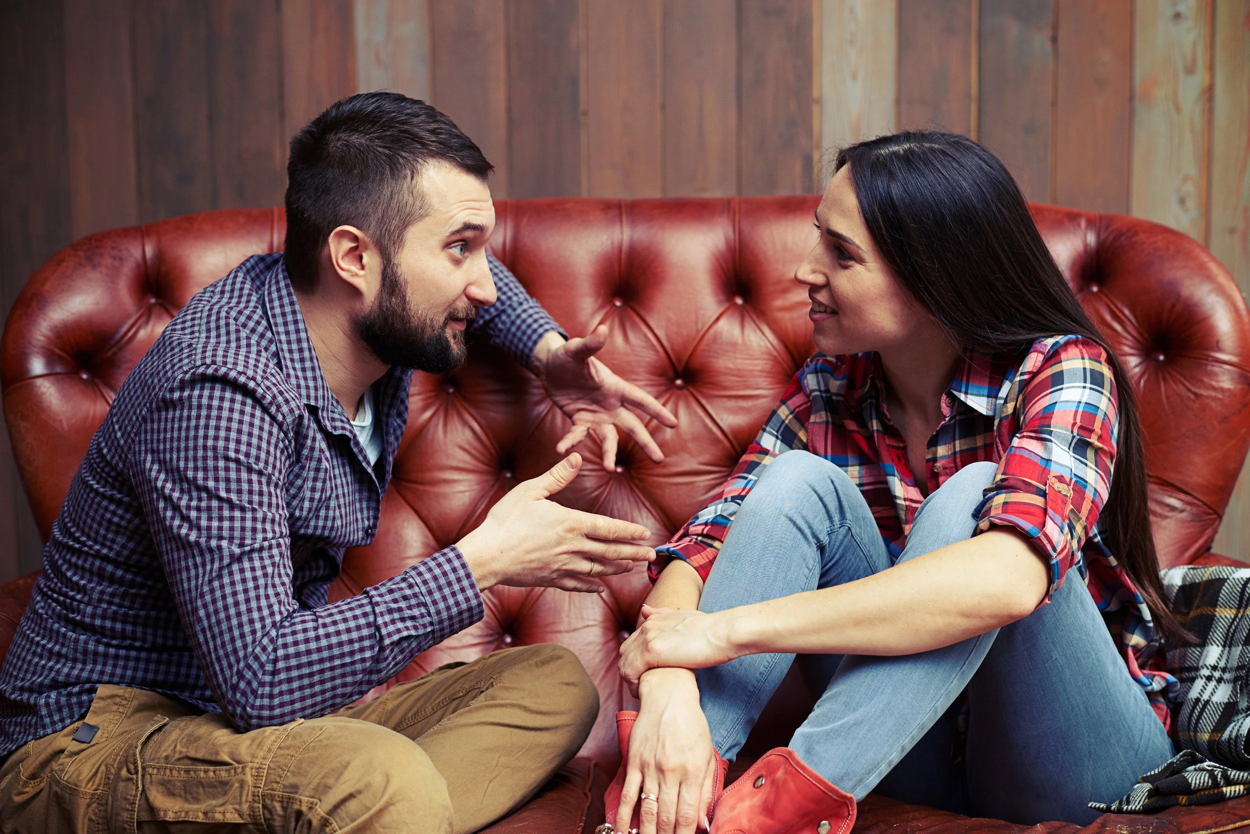 Couple sitting together in conversation