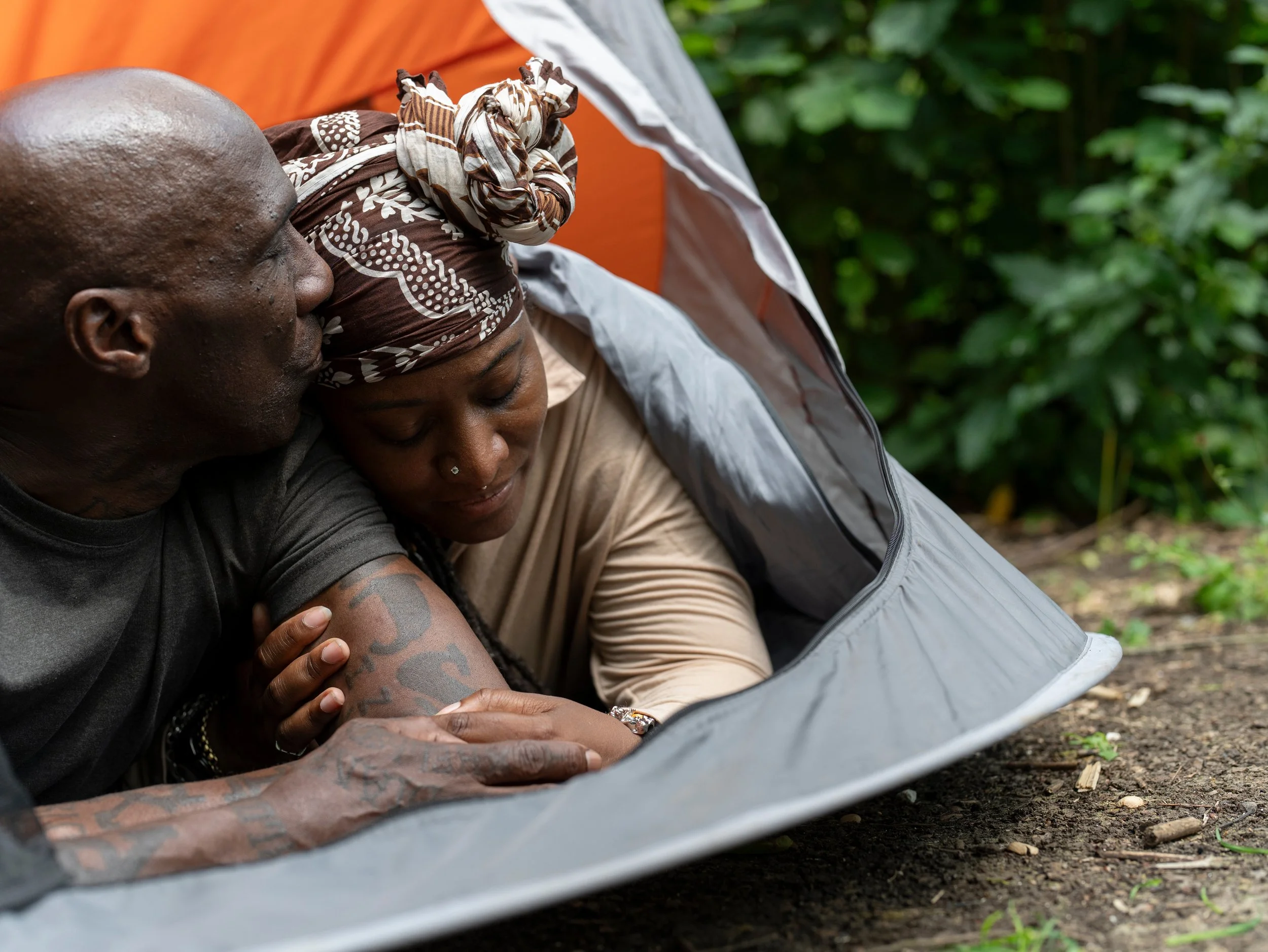 Couple sharing a tender, quiet moment together outdoors