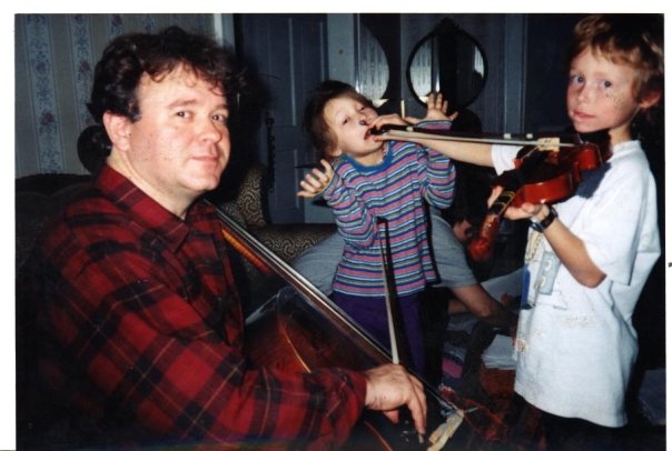 My dad, older brother, and I fooling around with our first webcam and some instruments sometime in the 1990's