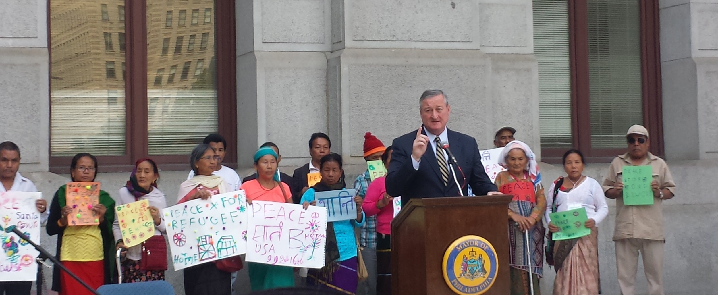 The Mayor Jim Kenney addressing the crowd about how "the city of brotherly love and sisterly affection" needs to be an accepting place for refugees. 