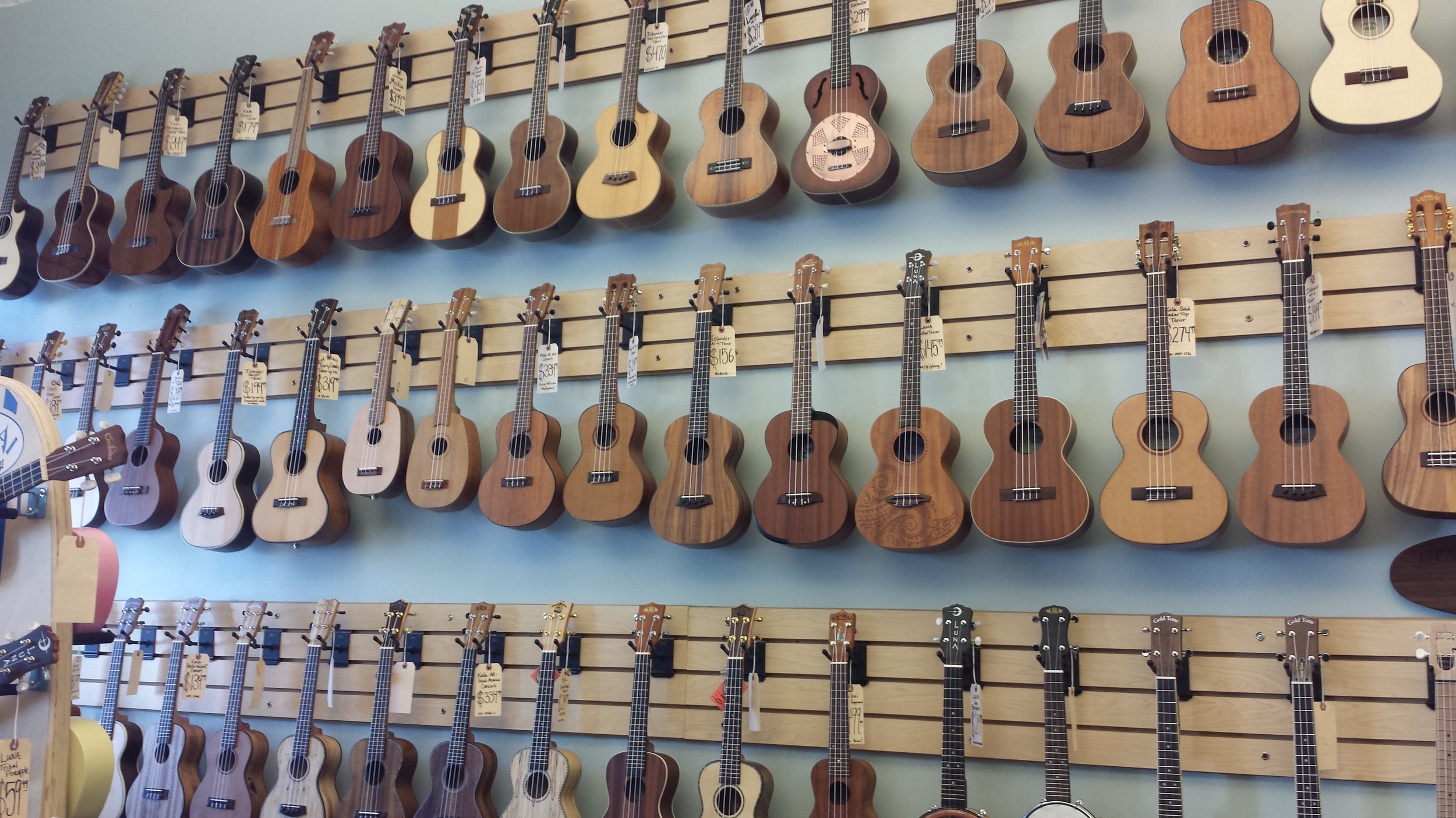 The most beautiful wall of ukes at Fan Guitar & Ukulele