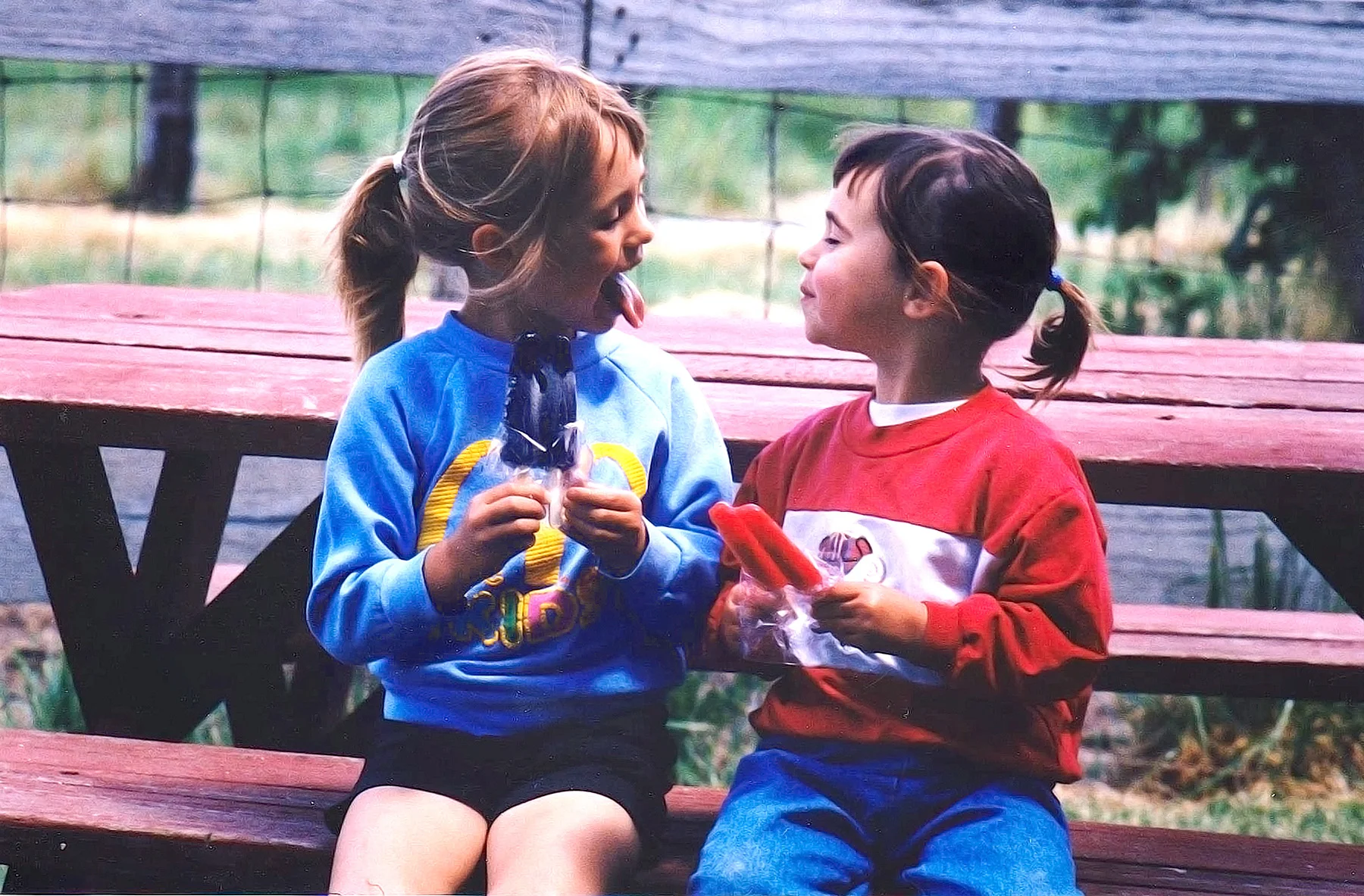 Hannah (my younger sister) and I eating popsicles, 1999.