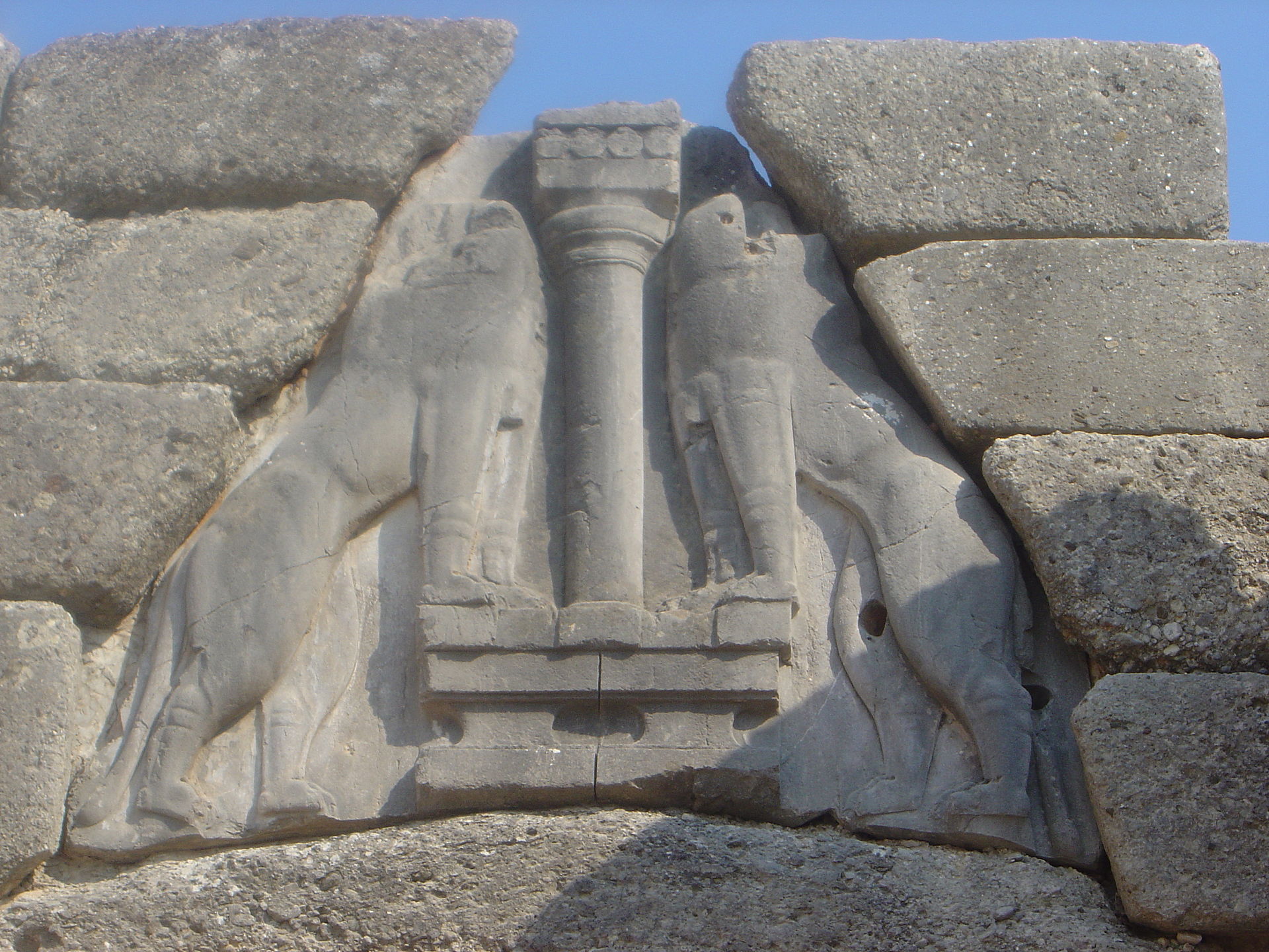 The Lion Gate (detail) of Mycenae - two lionesses flank the central column.