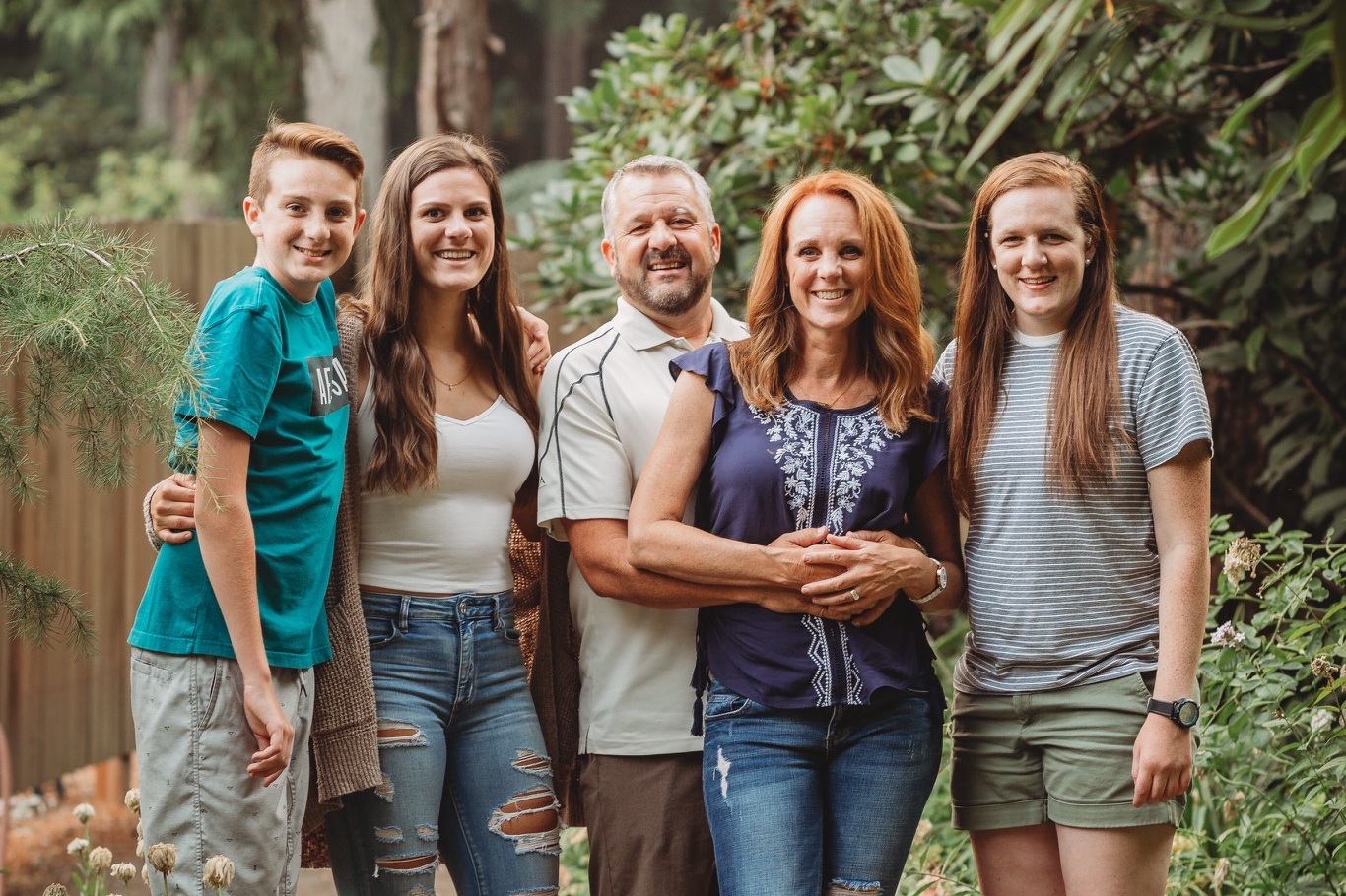 “My family is my whole heart”, says Marnie. Pictured here: her husband Kelly, and their three children.