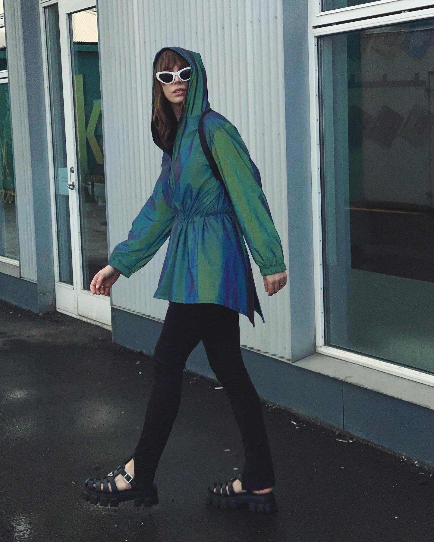 Catch Me If You Can. Turn heads in our 100% water repellant, 100% chic Northern Lightswear reflective rainwear. 
.
.
.
.
.
.
.
.
.
.
.
.
#shearling #fashion #iceland #sustainablefashion #wintercoat #scandinavian #custom #canadianmade #iceland #travel