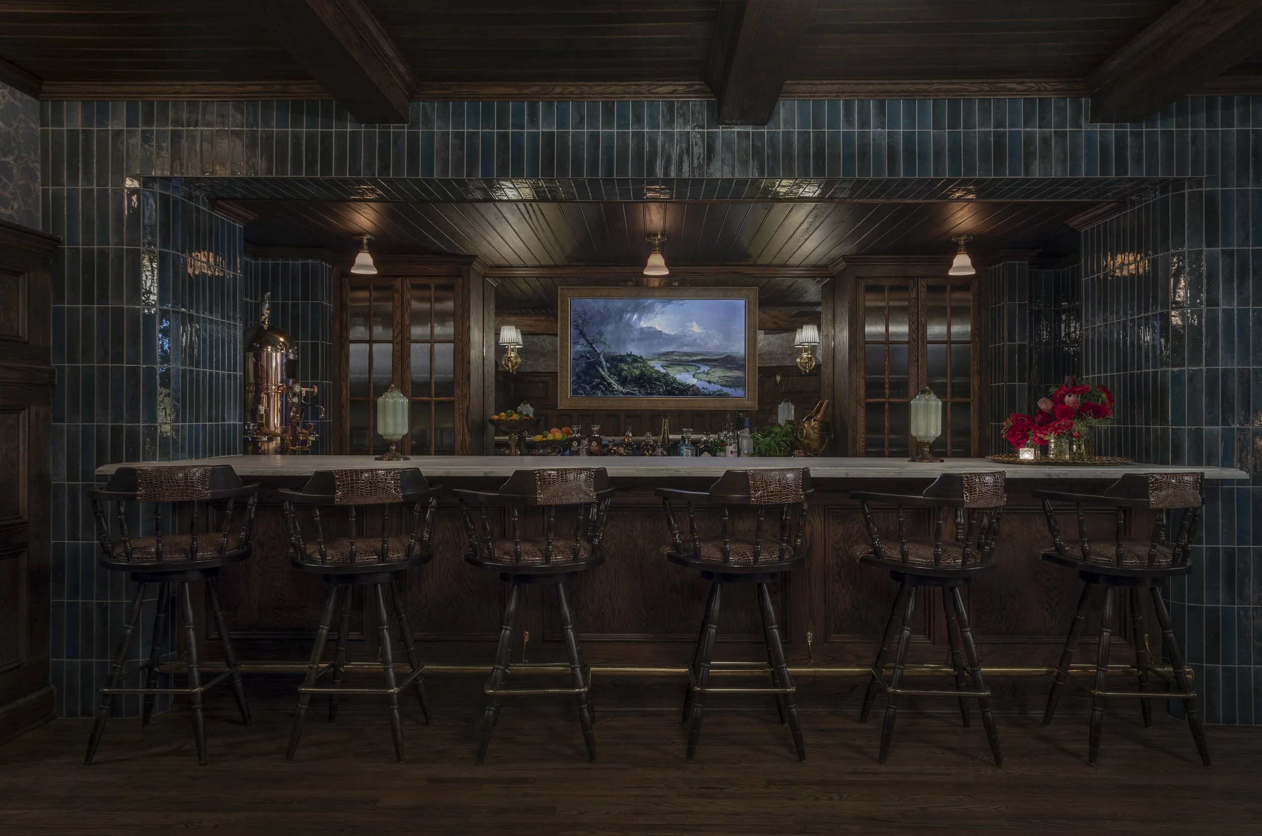 Blue glazed tile bar with captain’s stools and a landscape painting at The Colonel’s Club,
Baton Rouge
