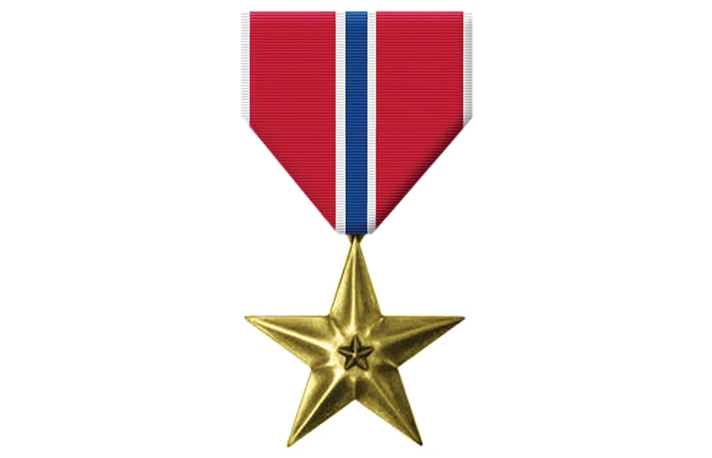 Awarded the  Bronze Star  for Bravery in Action 