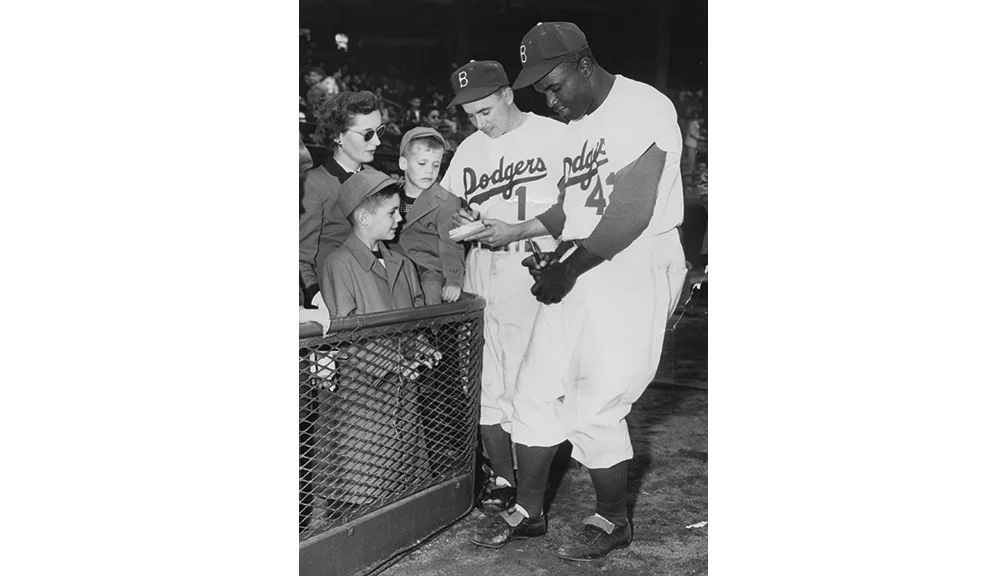   1951-68 Brooklyn Dodgers/Los Angeles Dodgers , Executive Vice President/General Manager  Evit, Peter, and Chris Bavasi with Pee Wee Reese and Jackie Robinson.&nbsp; 