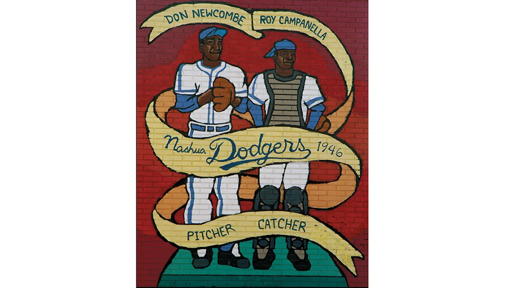Nashua (New Hampshire) Dodgers , Class B, New England League: Business Manager Honoring Roy Campanella and Don Newcombe, organized baseball’s first black battery of the 20th century, this mural in Nashua, N.H., remains a testament to the historic integration of the game there in 1946.