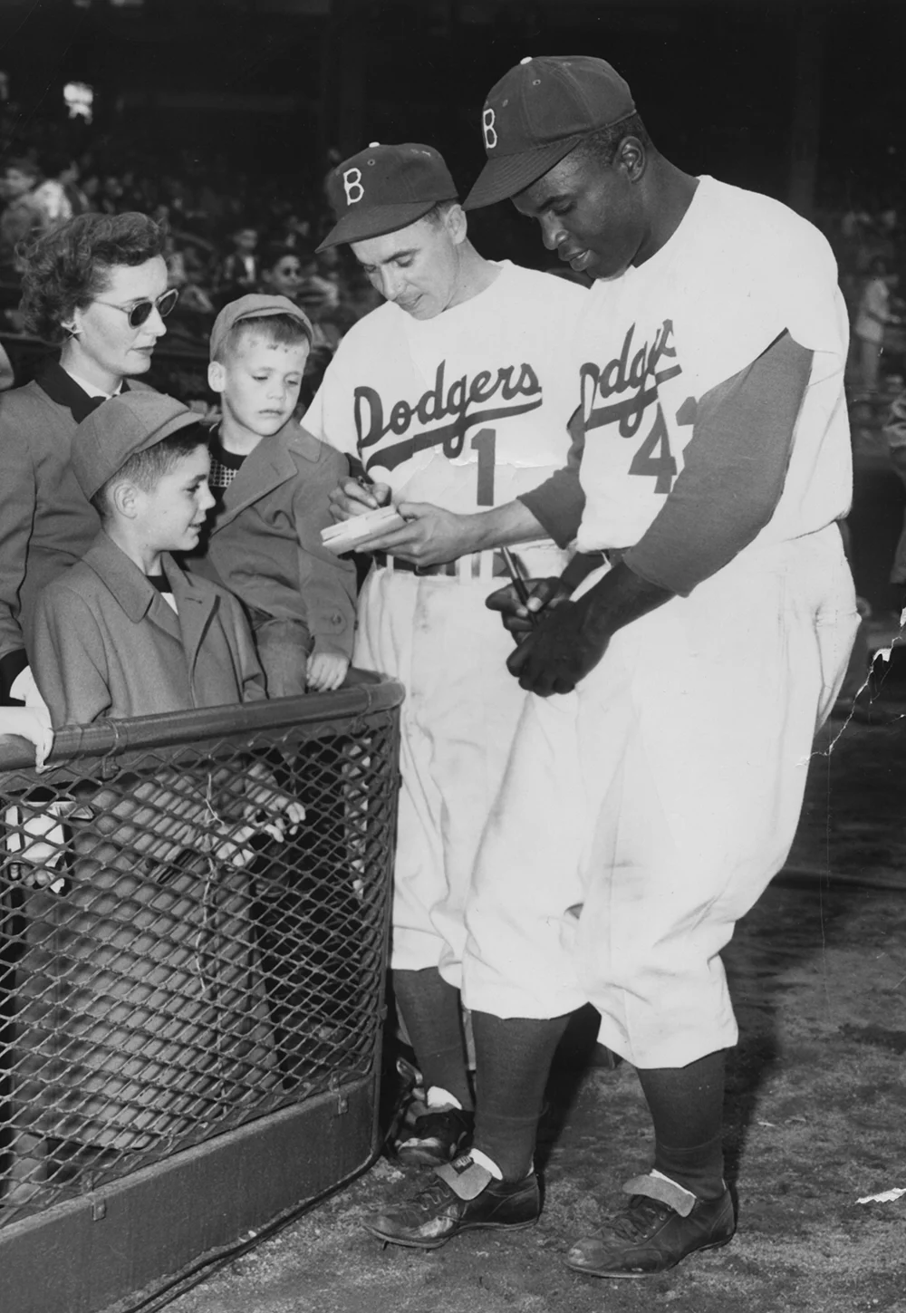 1951-1968: Brooklyn Dodgers/Los Angeles Dodgers , Executive Vice President/General Manager 1951, Evit, Peter, and Chris Bavasi with Pee Wee Reese and Jackie Robinson. 