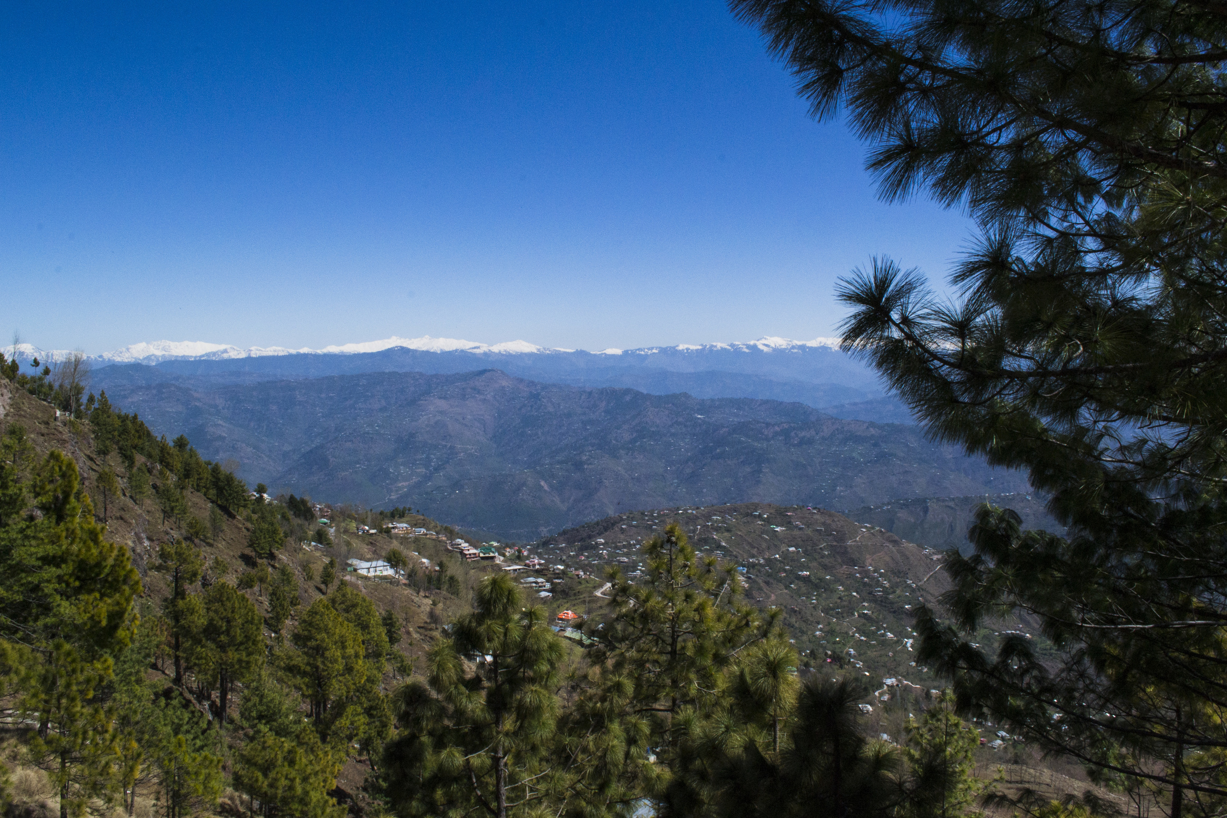 Snow-capped peaks create a refreshing view throughout the year.