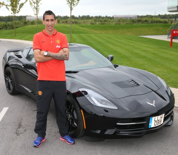 Aftalen med Chevrolet var et stort spring op fra AON-aftalen. Her poserer Angel di Maria foran en af firmaets biler. Foto: Getty Images/John Peters