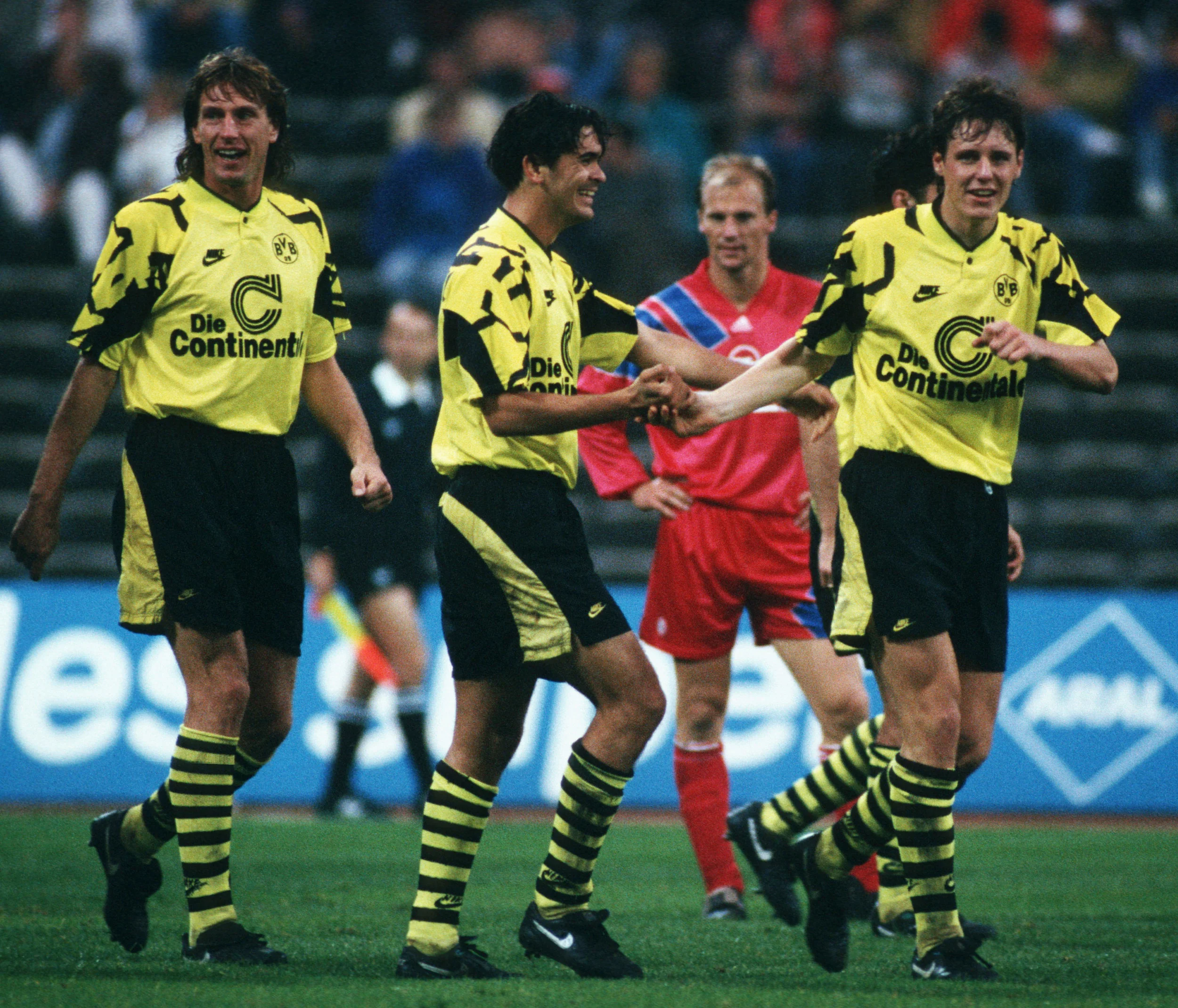 Schultz, Poschner og Povlsen. Foto: Getty Images/Bongarts