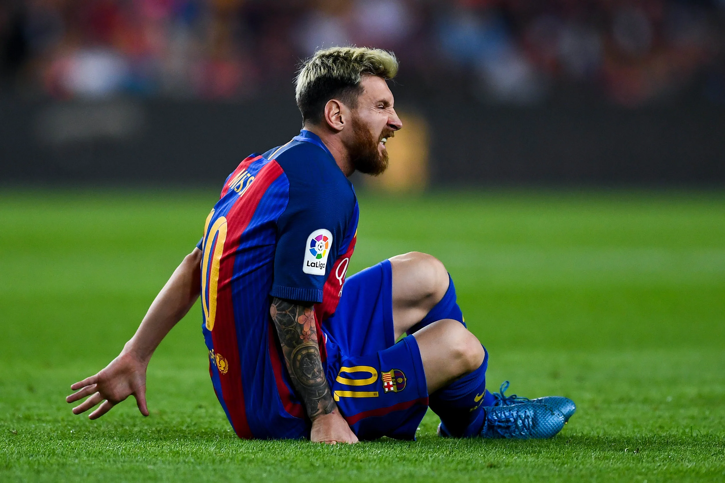 Lionel Messi meldes ude i tre uger efter den lyskeskade, han pådrog sig mod Atletico Madrid. Foto: Getty Images