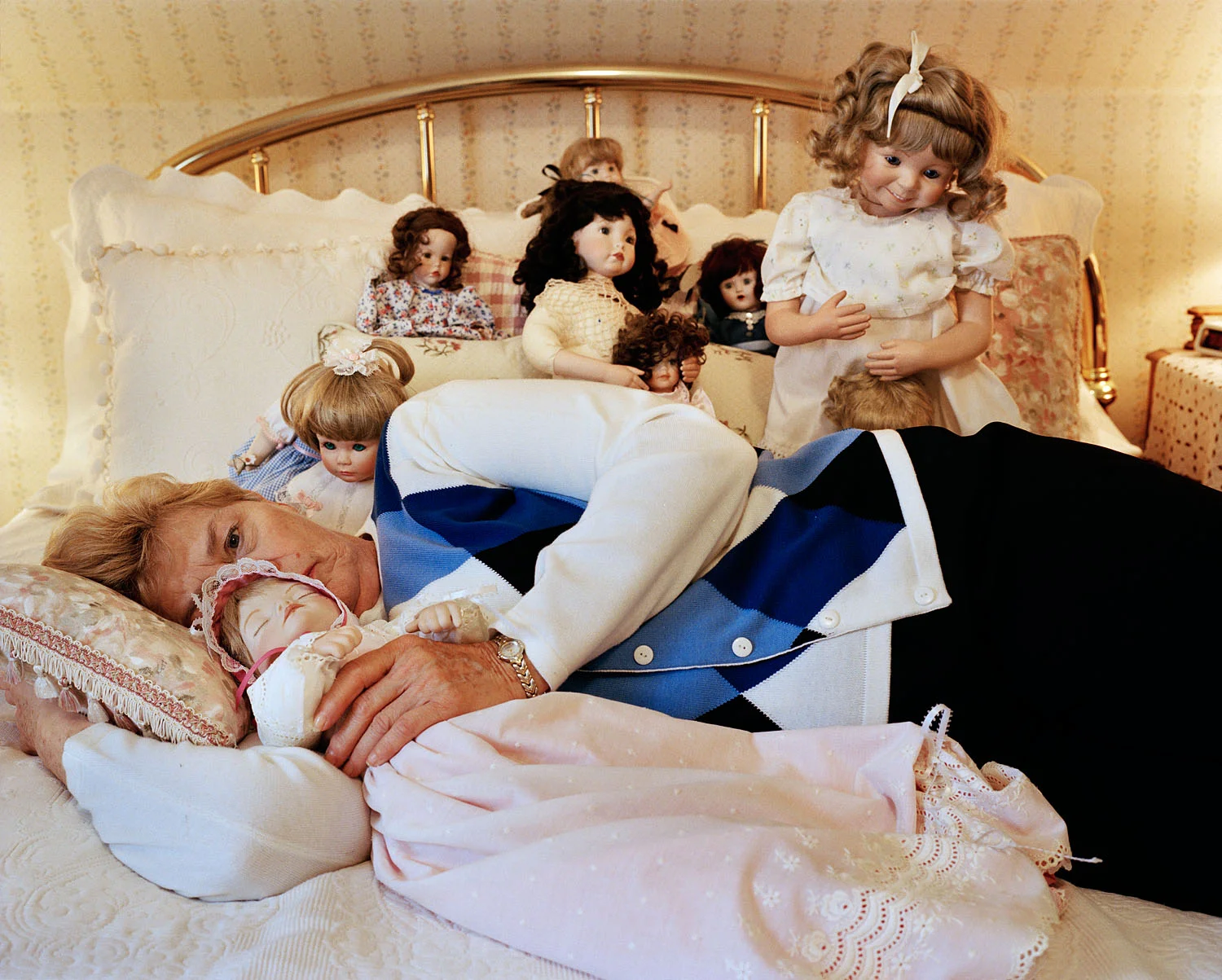 Woman with doll collection, Exeter, NH, 2003