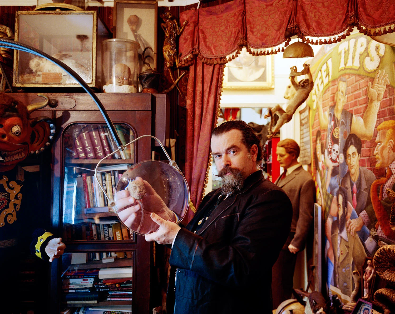 Man with 'Odditorium' collection, Brooklyn, NY, 2005