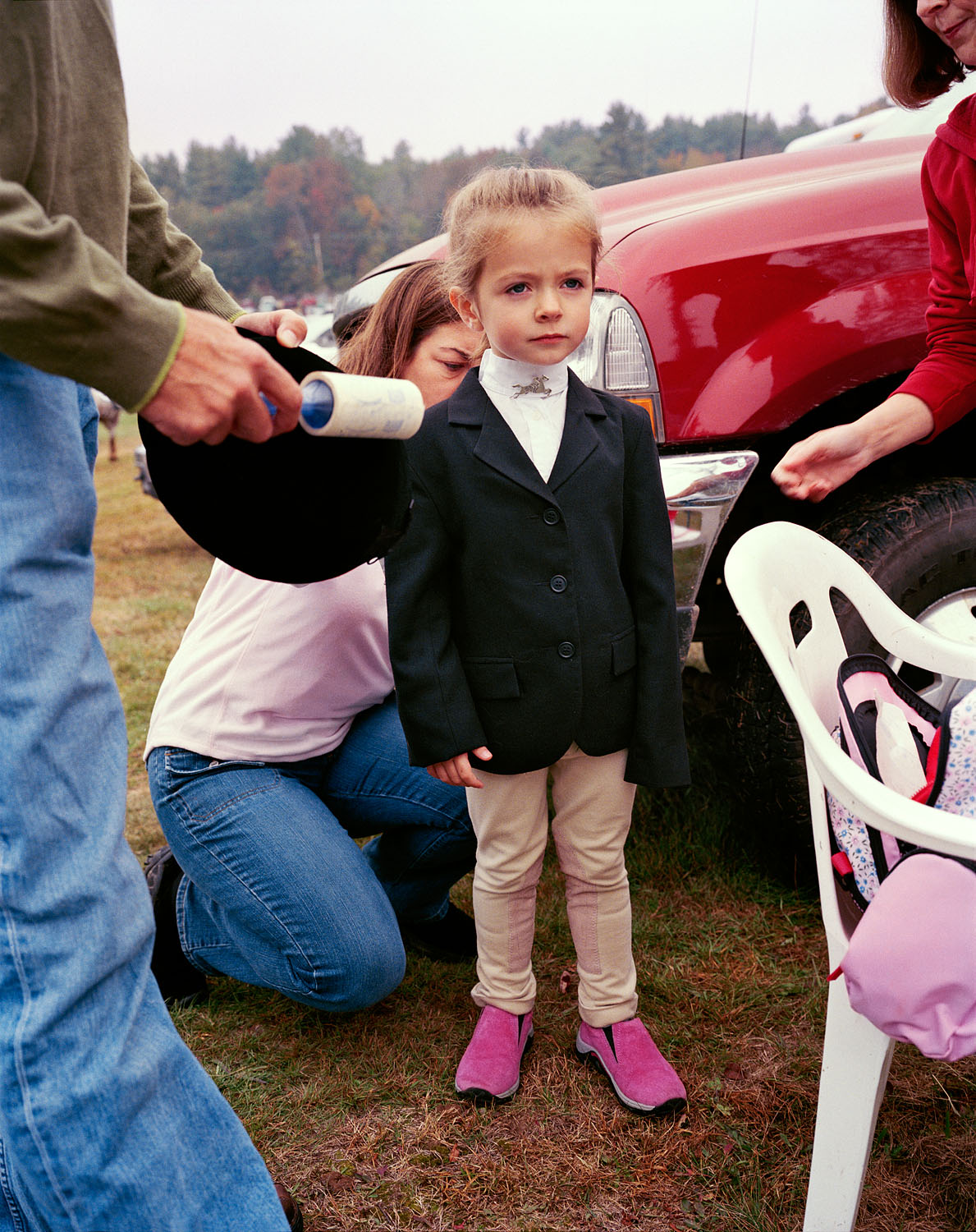 Girl being prepared for a horse show, Sandwich, NH, 2004