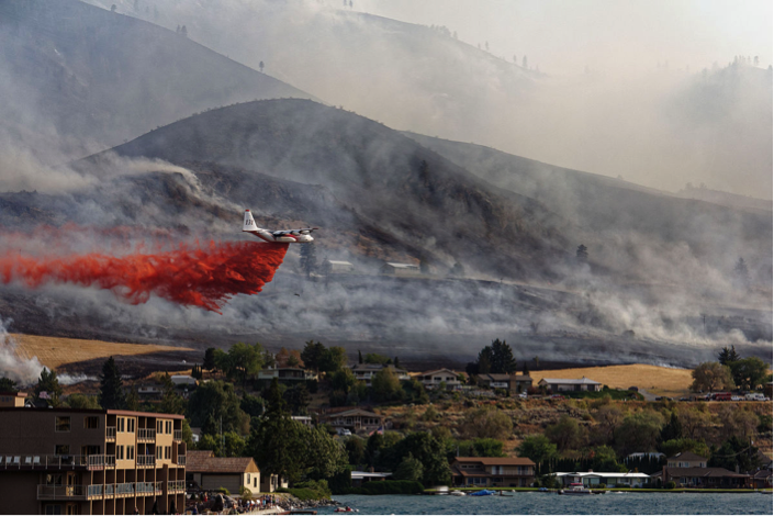 Phos-Chek fire retardant is dropped in Okanogan County, Washington in the summer of 2015. Creative commons image.